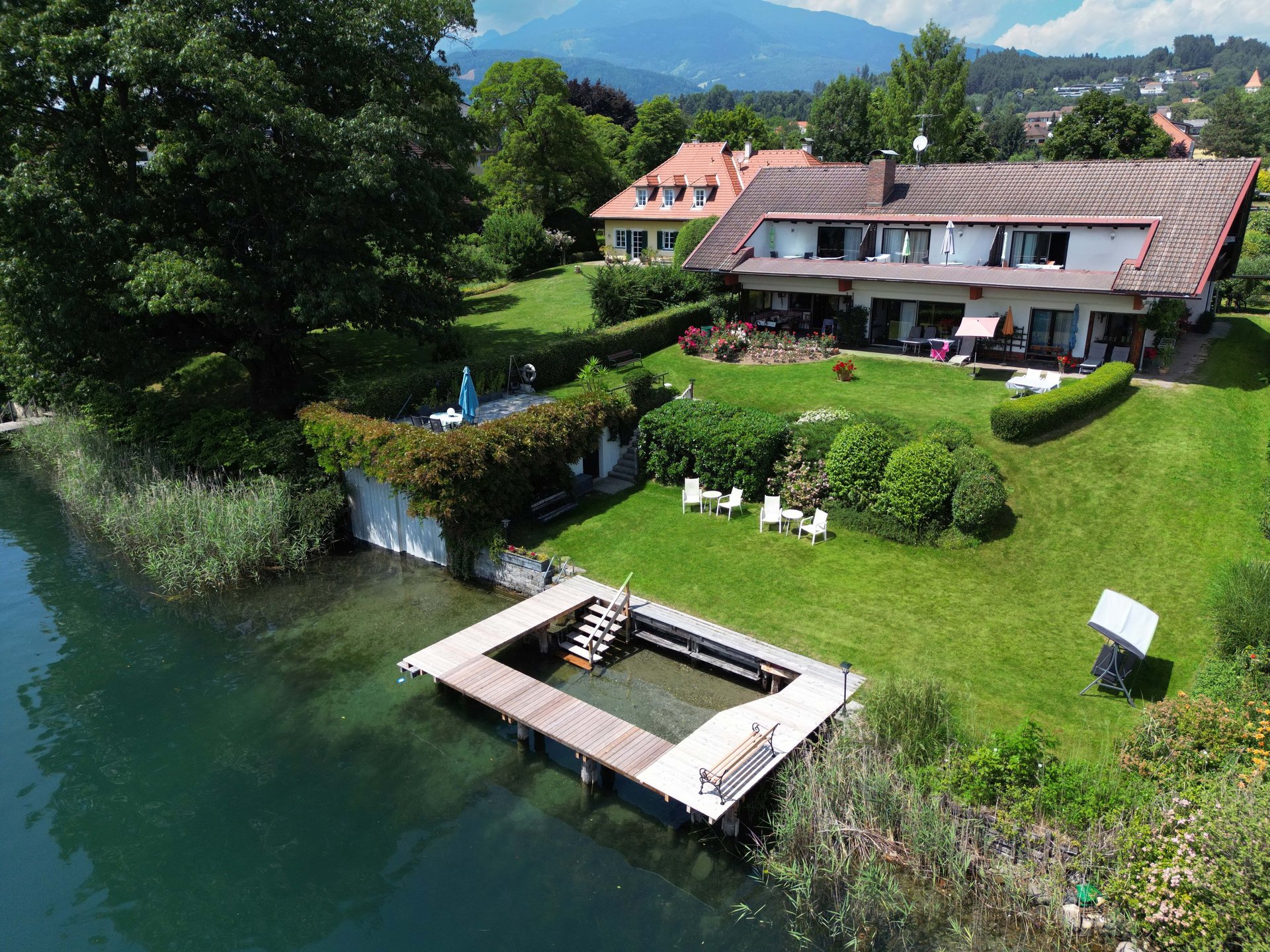 black and brown leather padded tub sofa