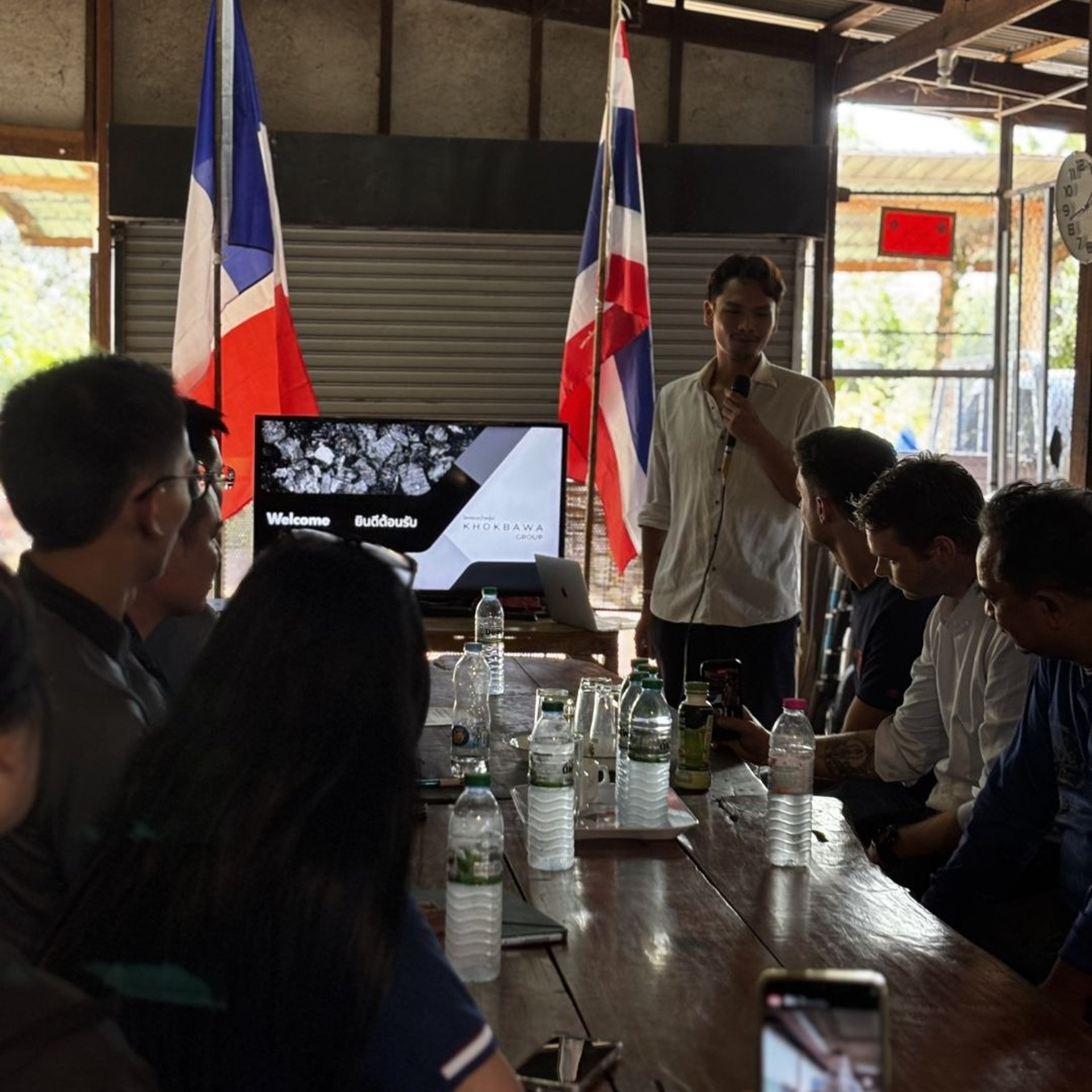 person in black long sleeve shirt holding persons hand