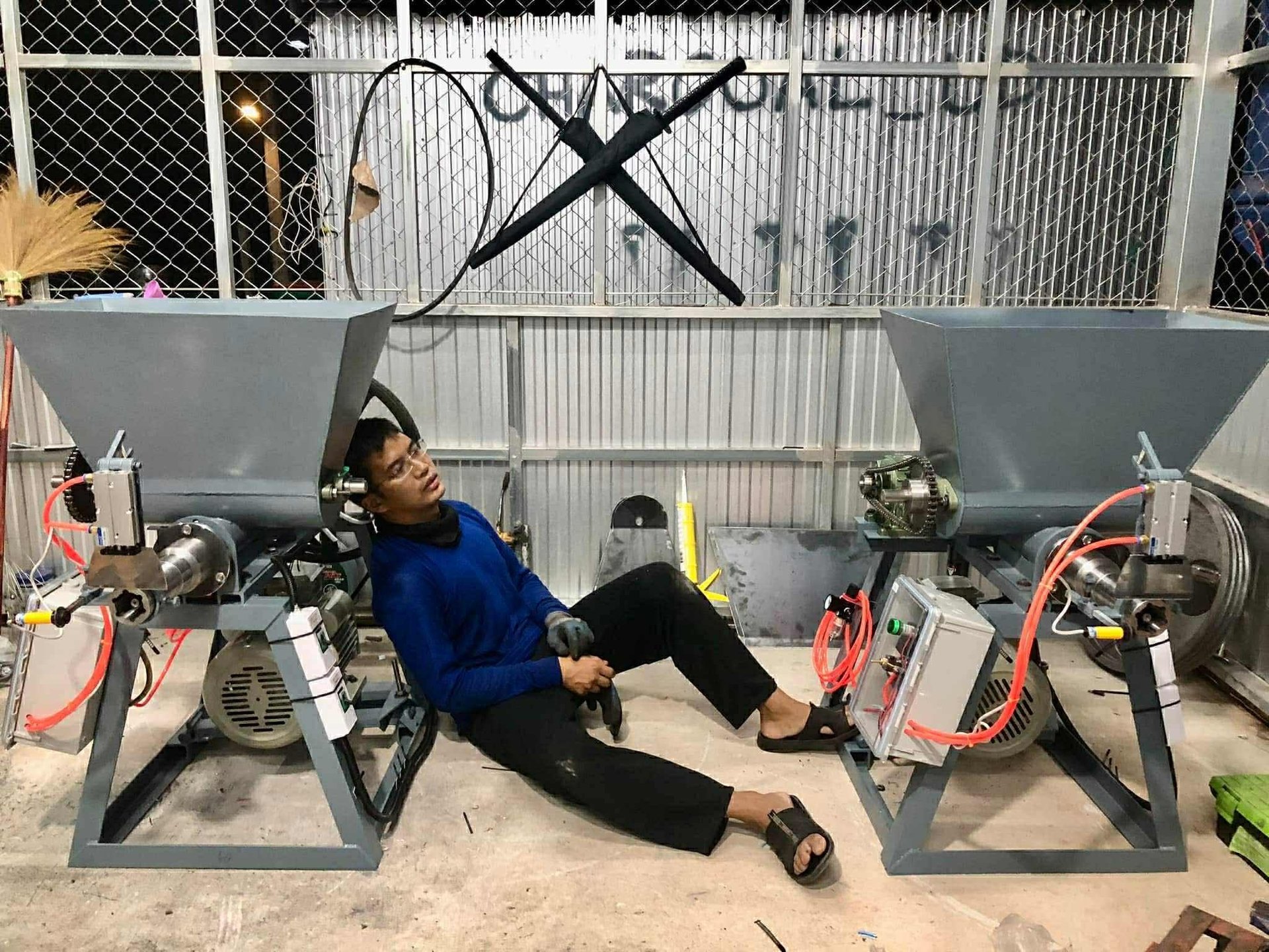 green and white tractor on green grass field during daytime