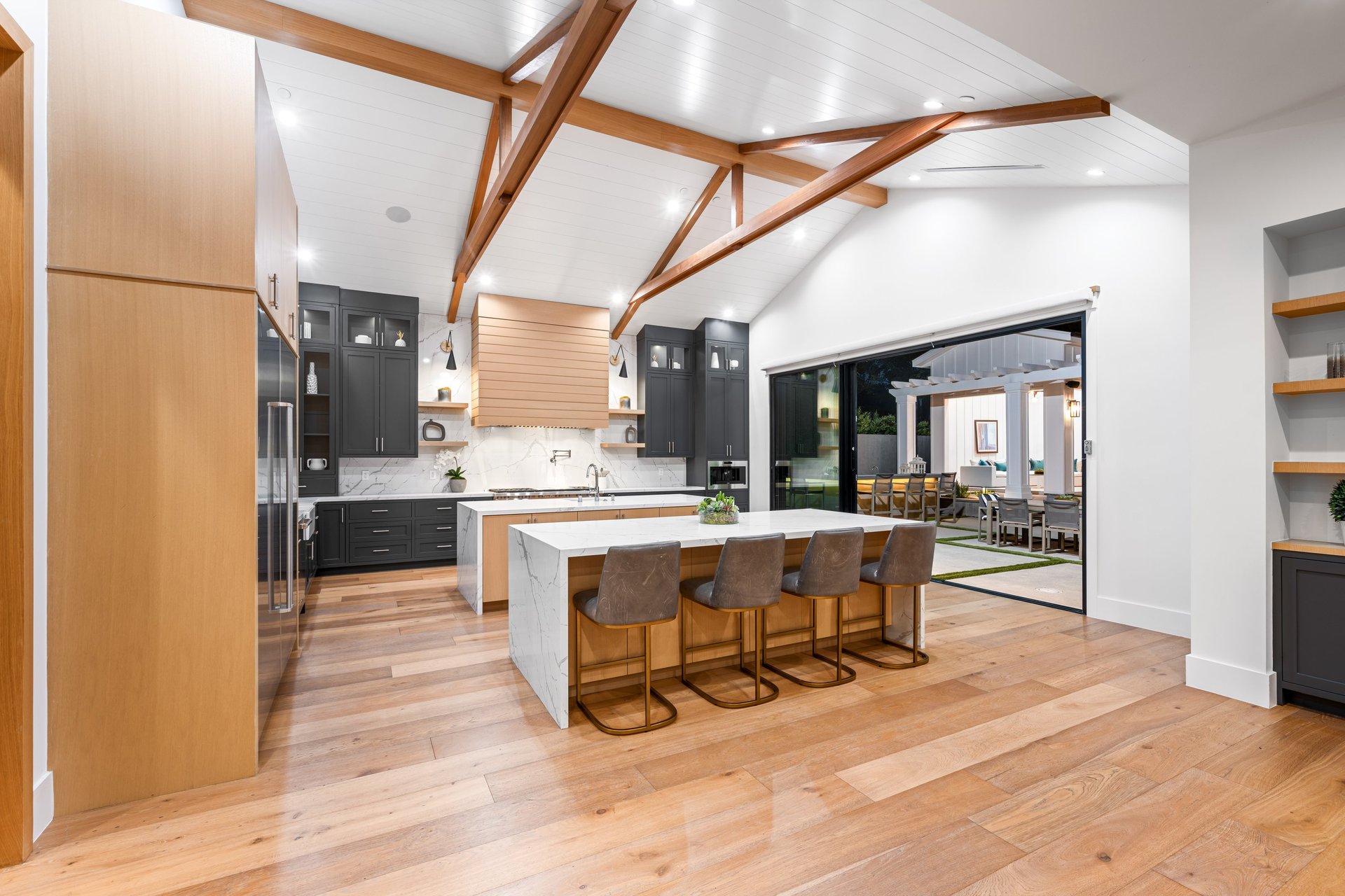 black and brown leather padded tub sofa