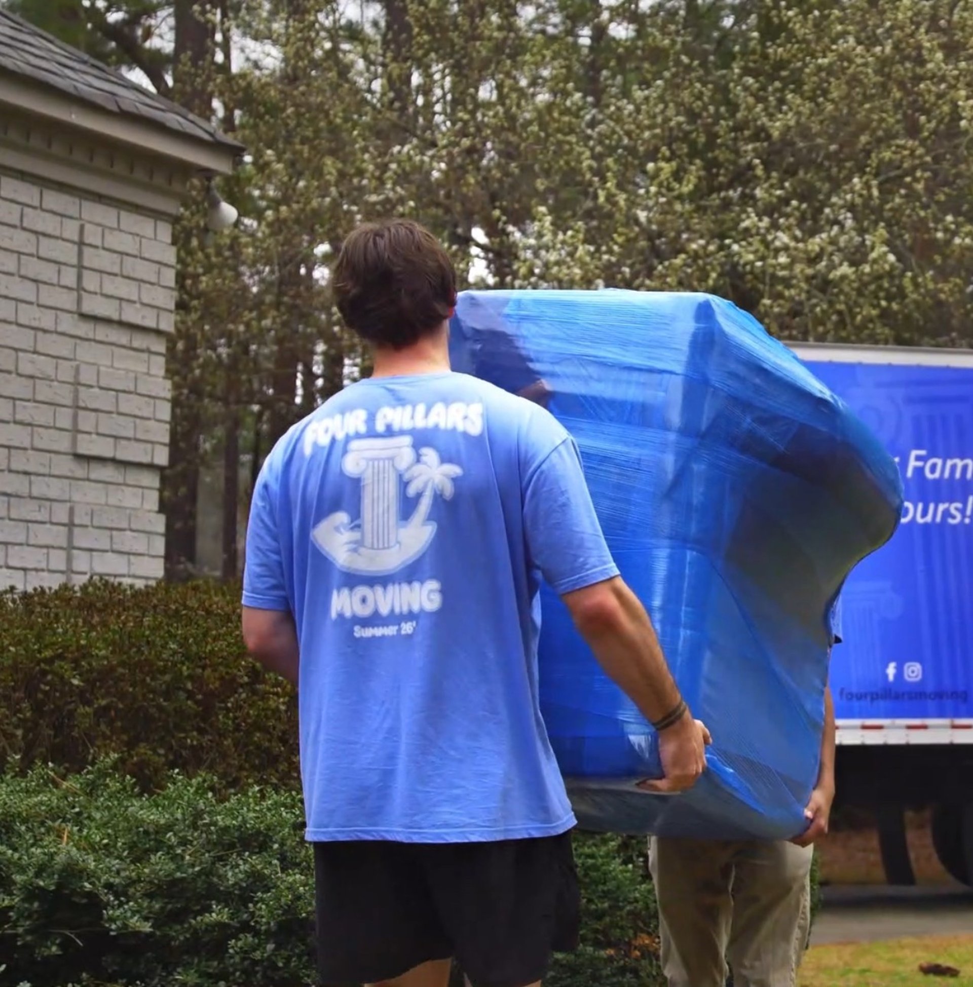 black and brown leather padded tub sofa