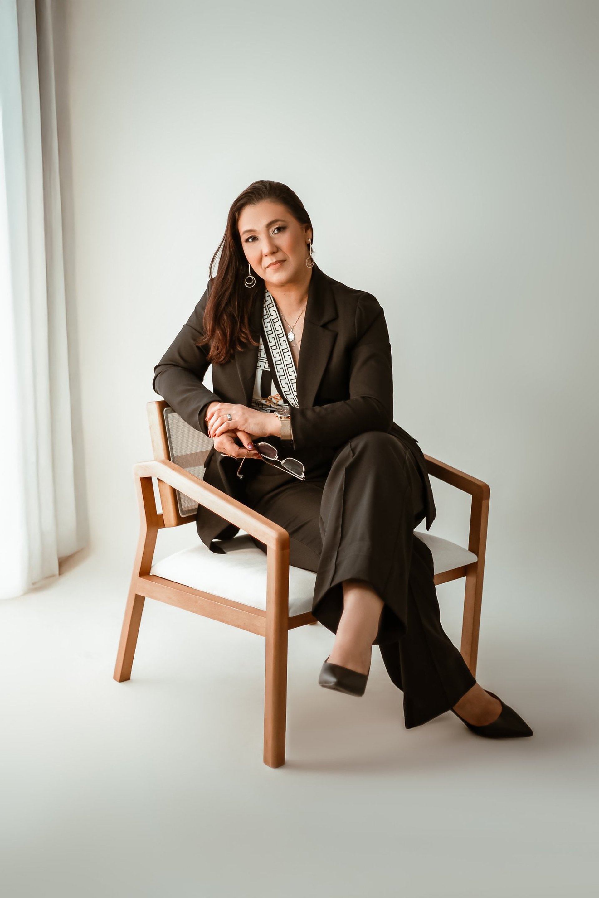 black and brown leather padded tub sofa