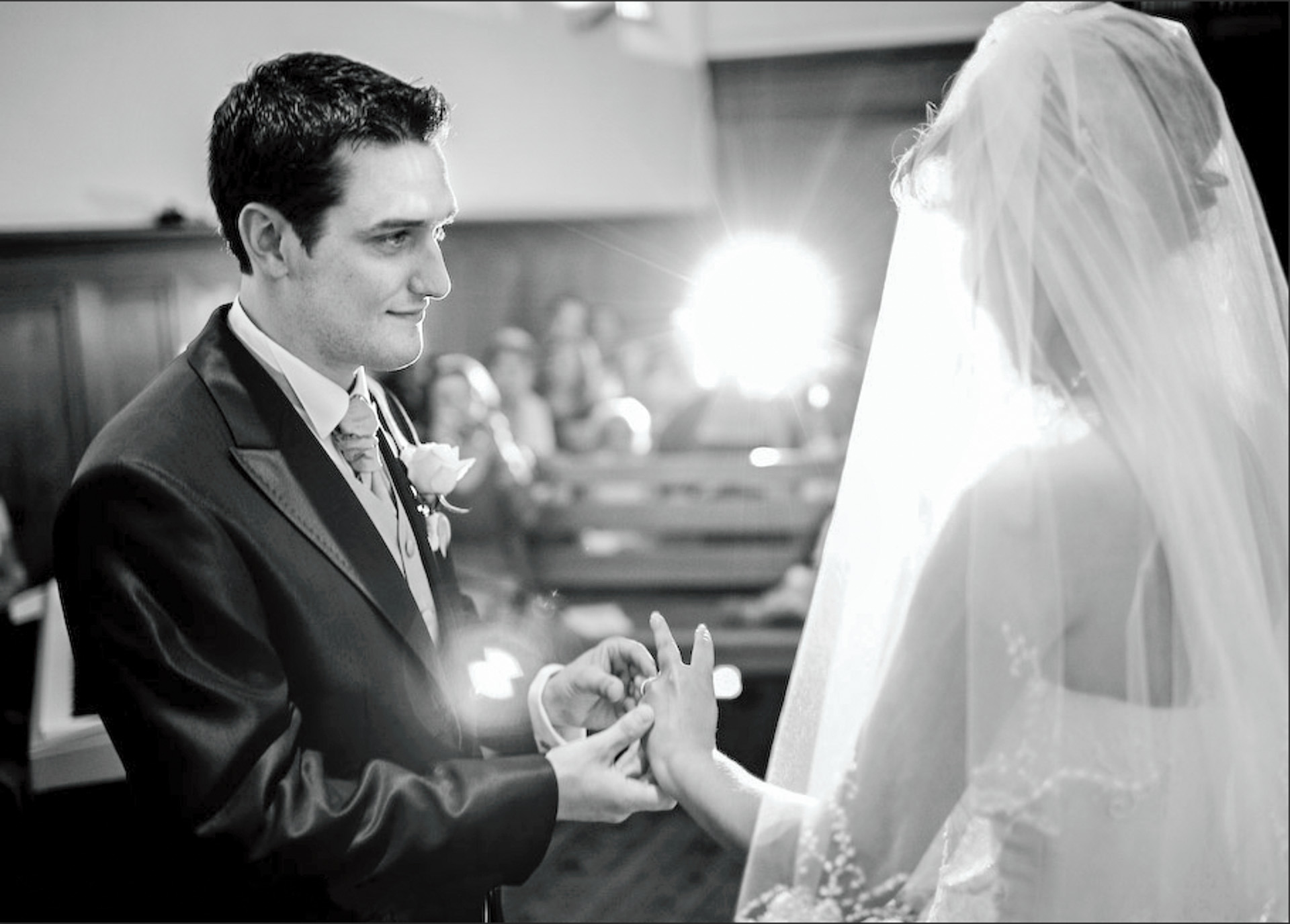 an abstract photo of a curved building with a blue sky in the background