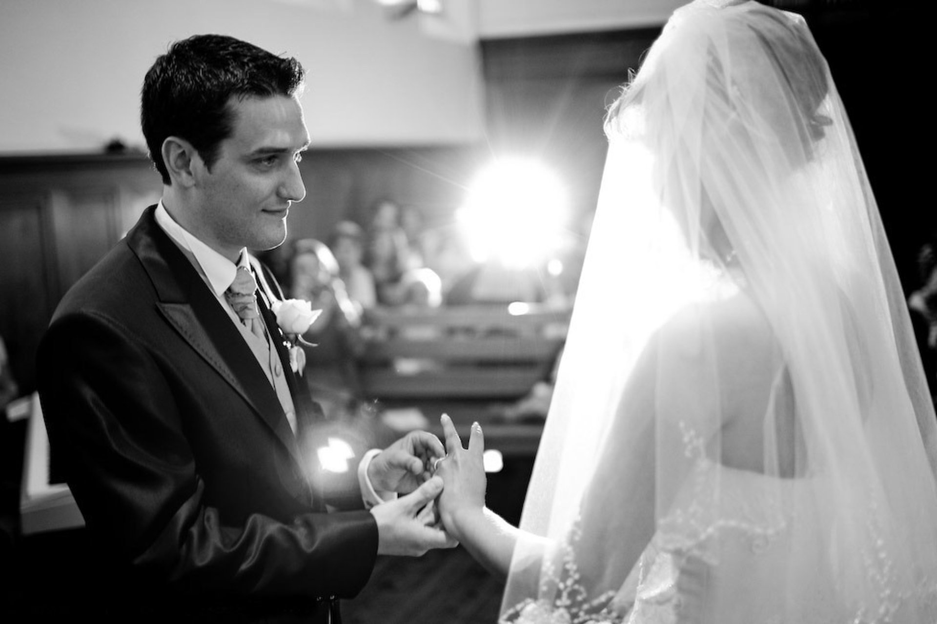 an abstract photo of a curved building with a blue sky in the background