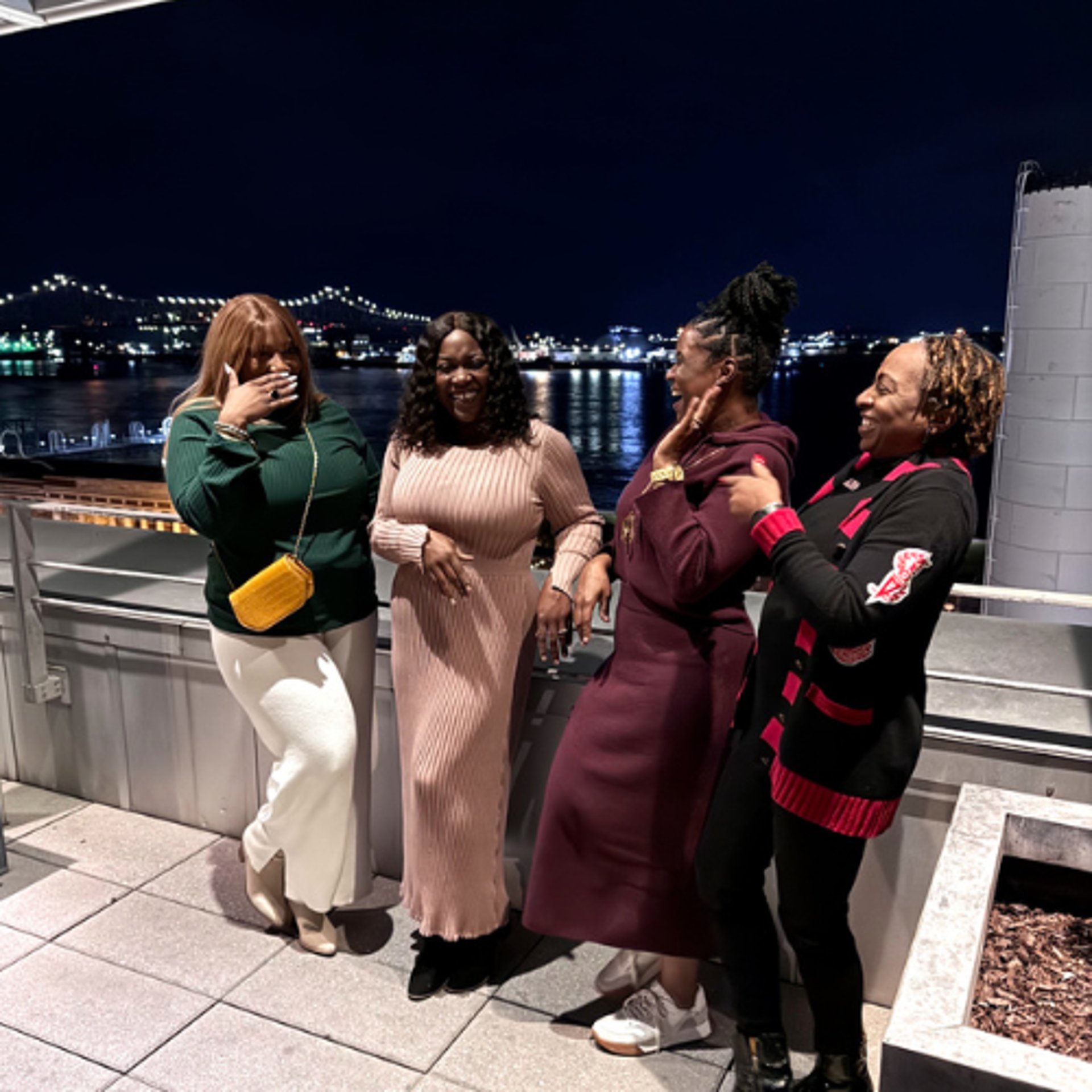 an abstract photo of a curved building with a blue sky in the background
