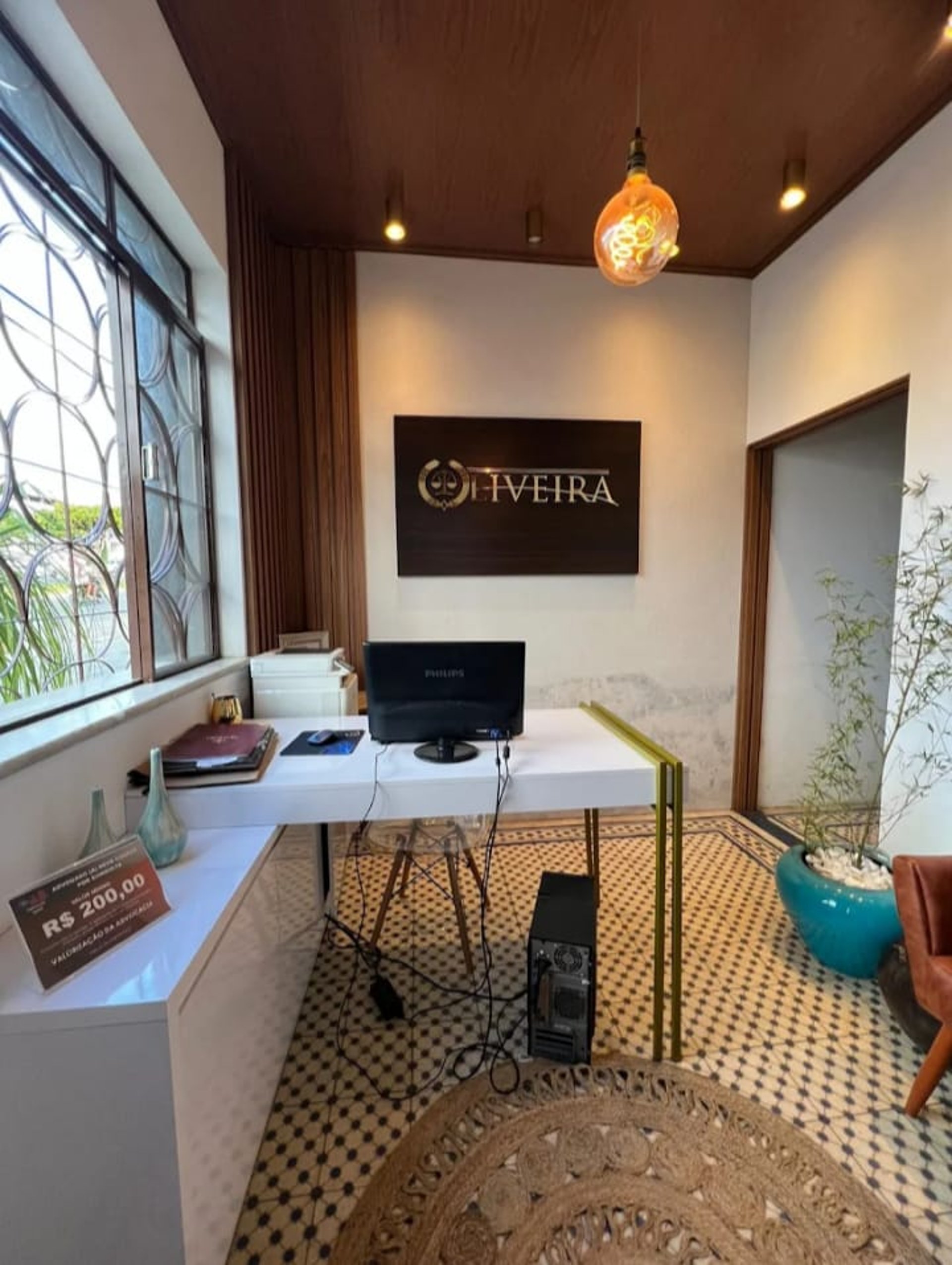 black ip desk phone on black wooden table