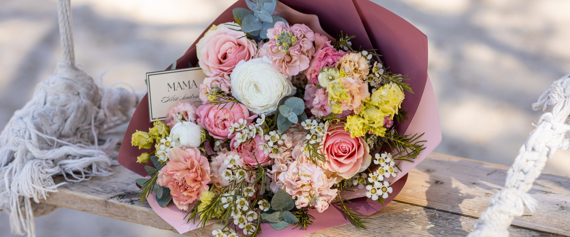 an abstract photo of a curved building with a blue sky in the background
