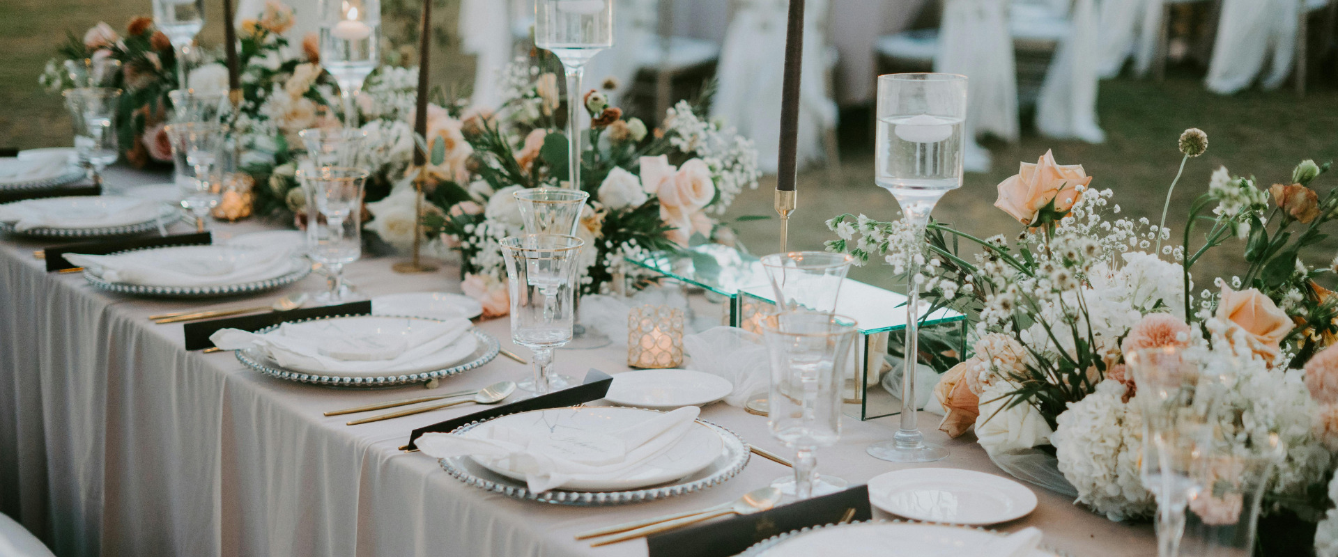 an abstract photo of a curved building with a blue sky in the background