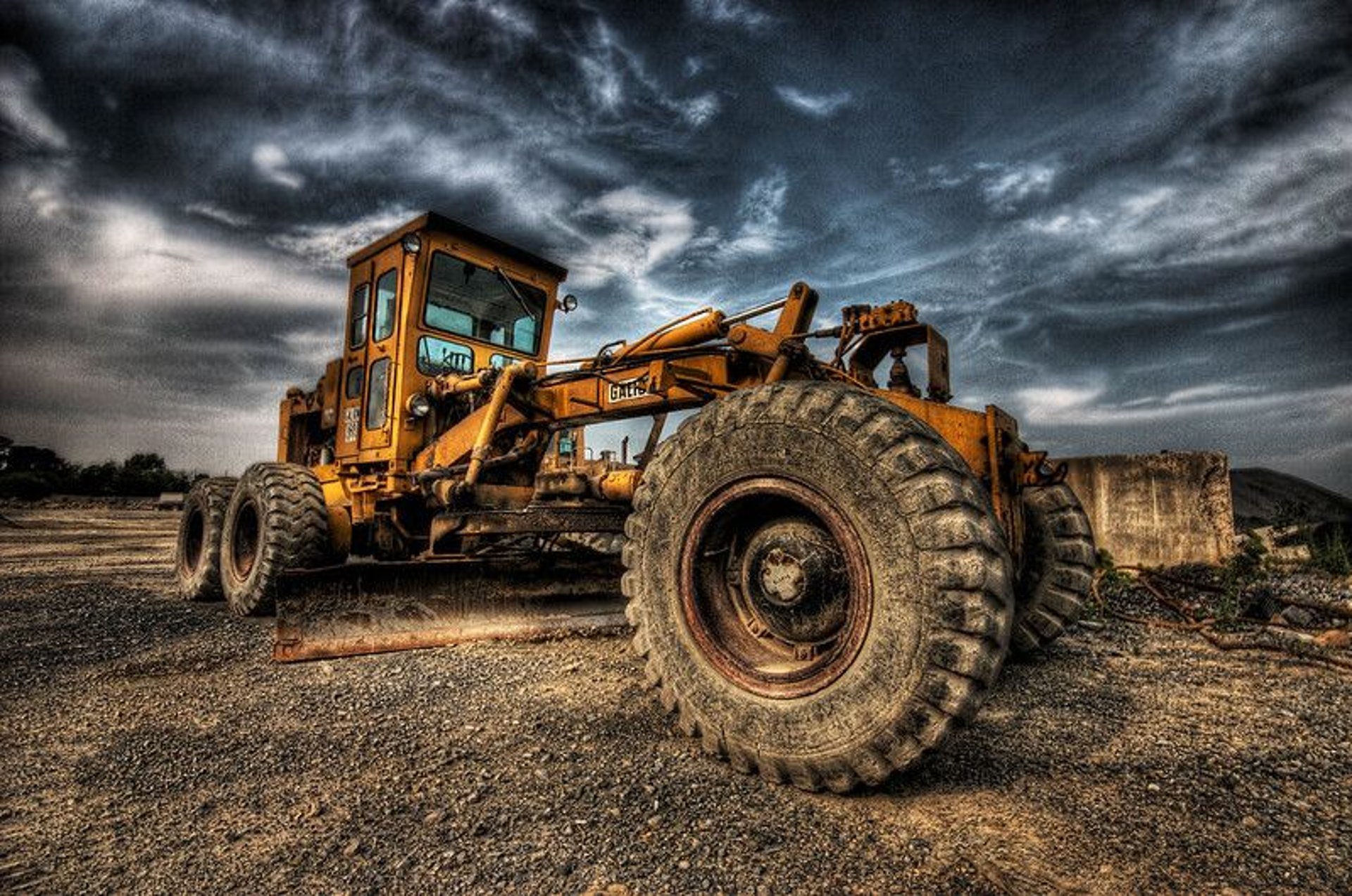 an abstract photo of a curved building with a blue sky in the background