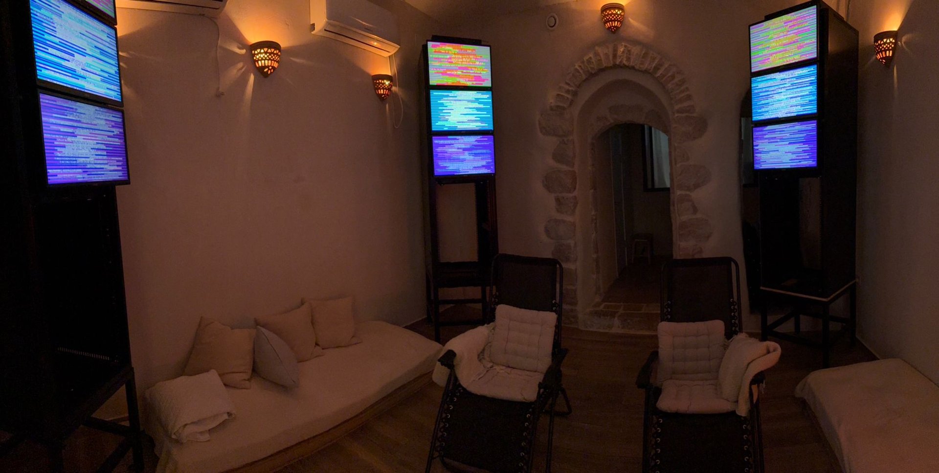 an abstract photo of a curved building with a blue sky in the background