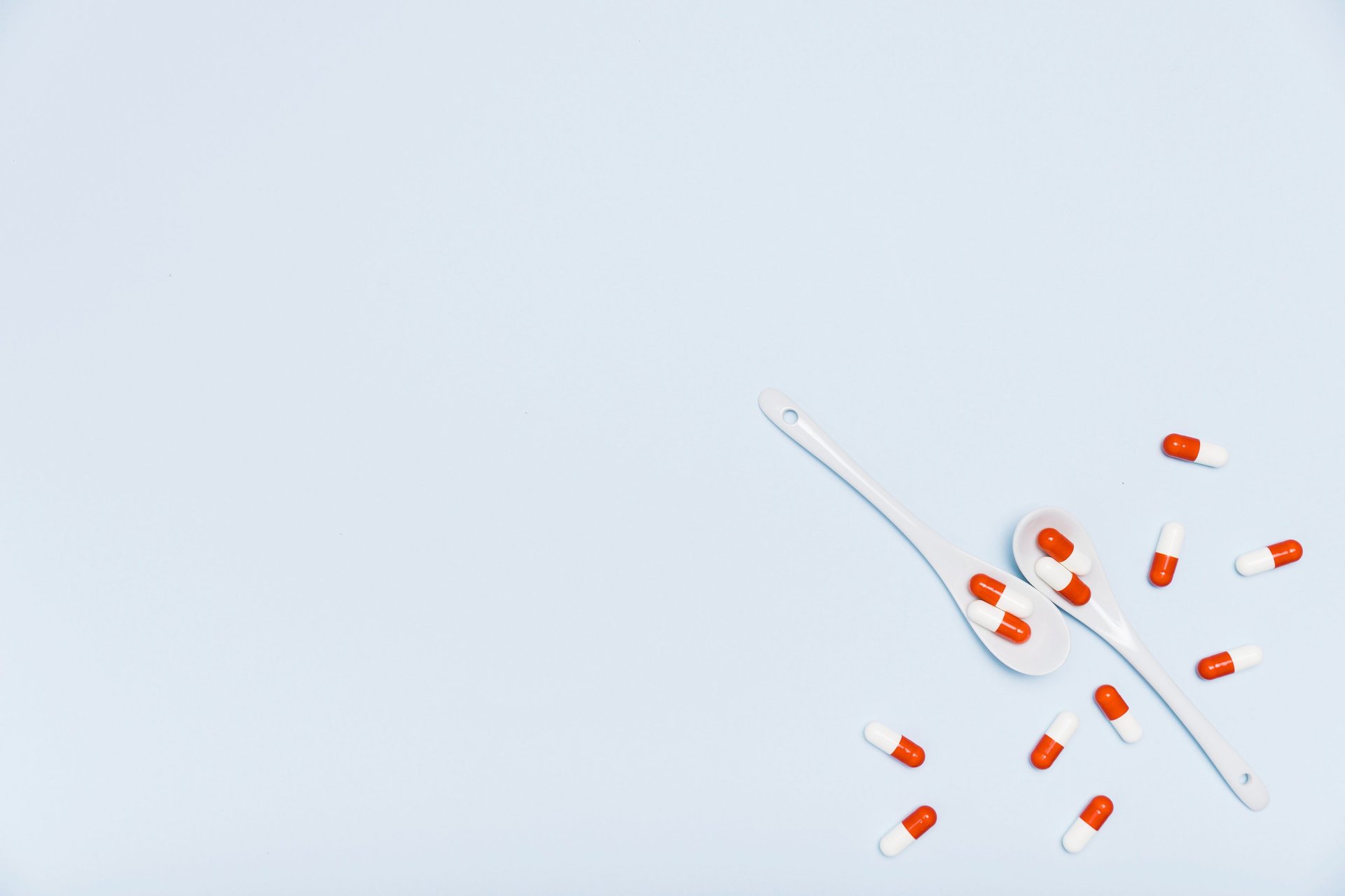 orange and white medication pill