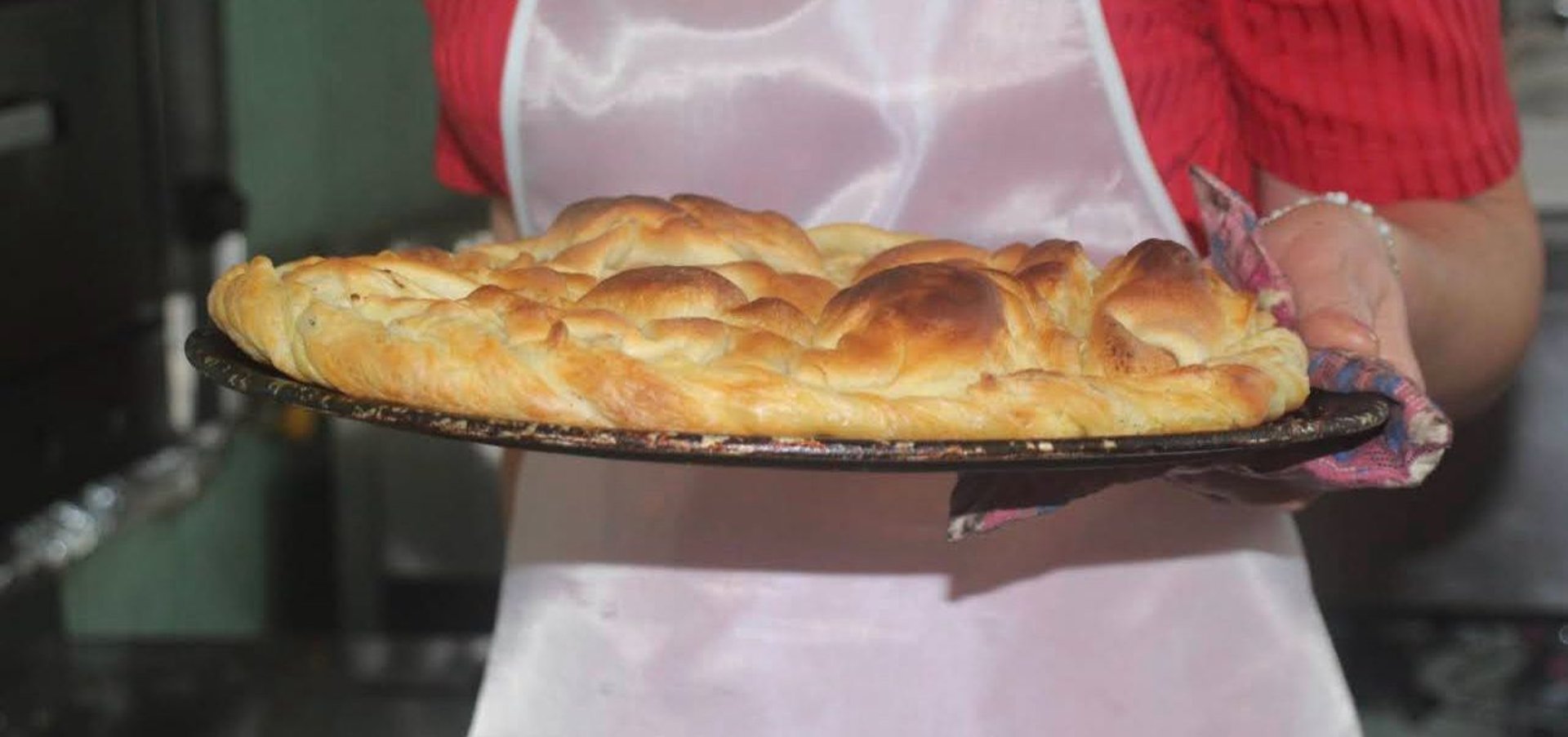 woman wearing yellow long-sleeved dress under white clouds and blue sky during daytime