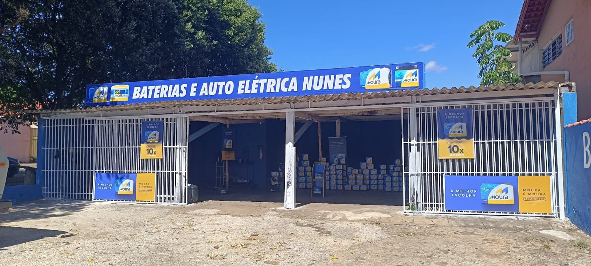an abstract photo of a curved building with a blue sky in the background