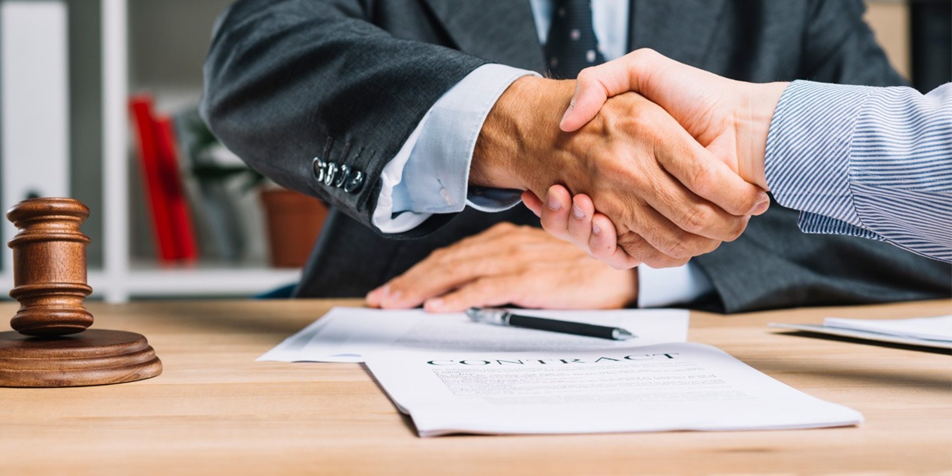 a statue of a person holding a staff