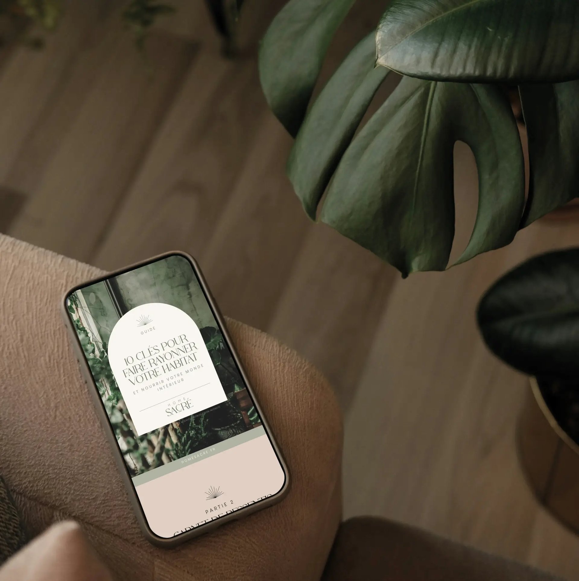 a laptop computer sitting on top of a wooden table