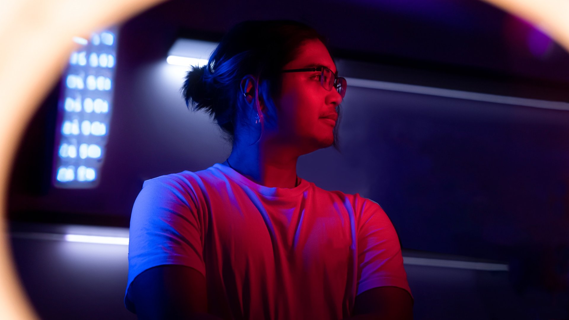 an abstract photo of a curved building with a blue sky in the background