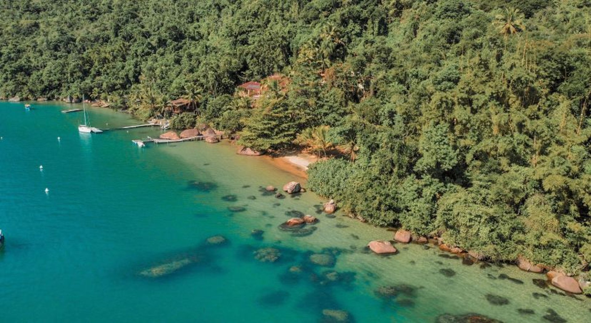 an abstract photo of a curved building with a blue sky in the background