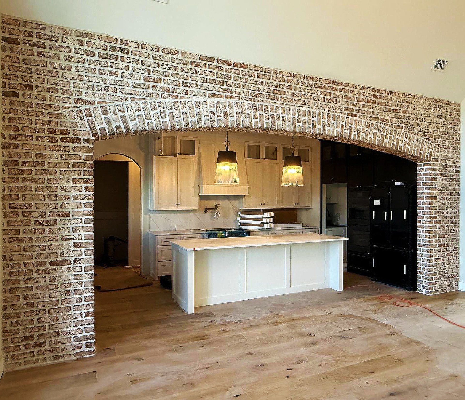 woman wearing yellow long-sleeved dress under white clouds and blue sky during daytime