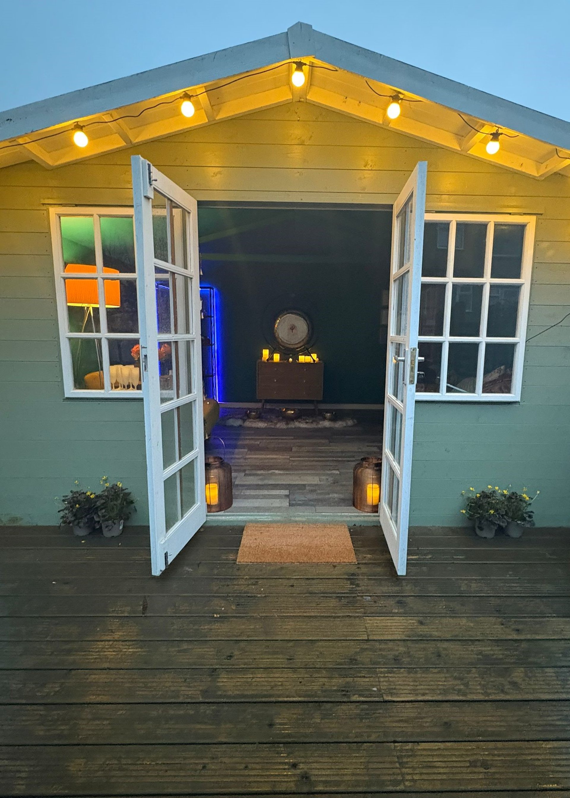 an abstract photo of a curved building with a blue sky in the background