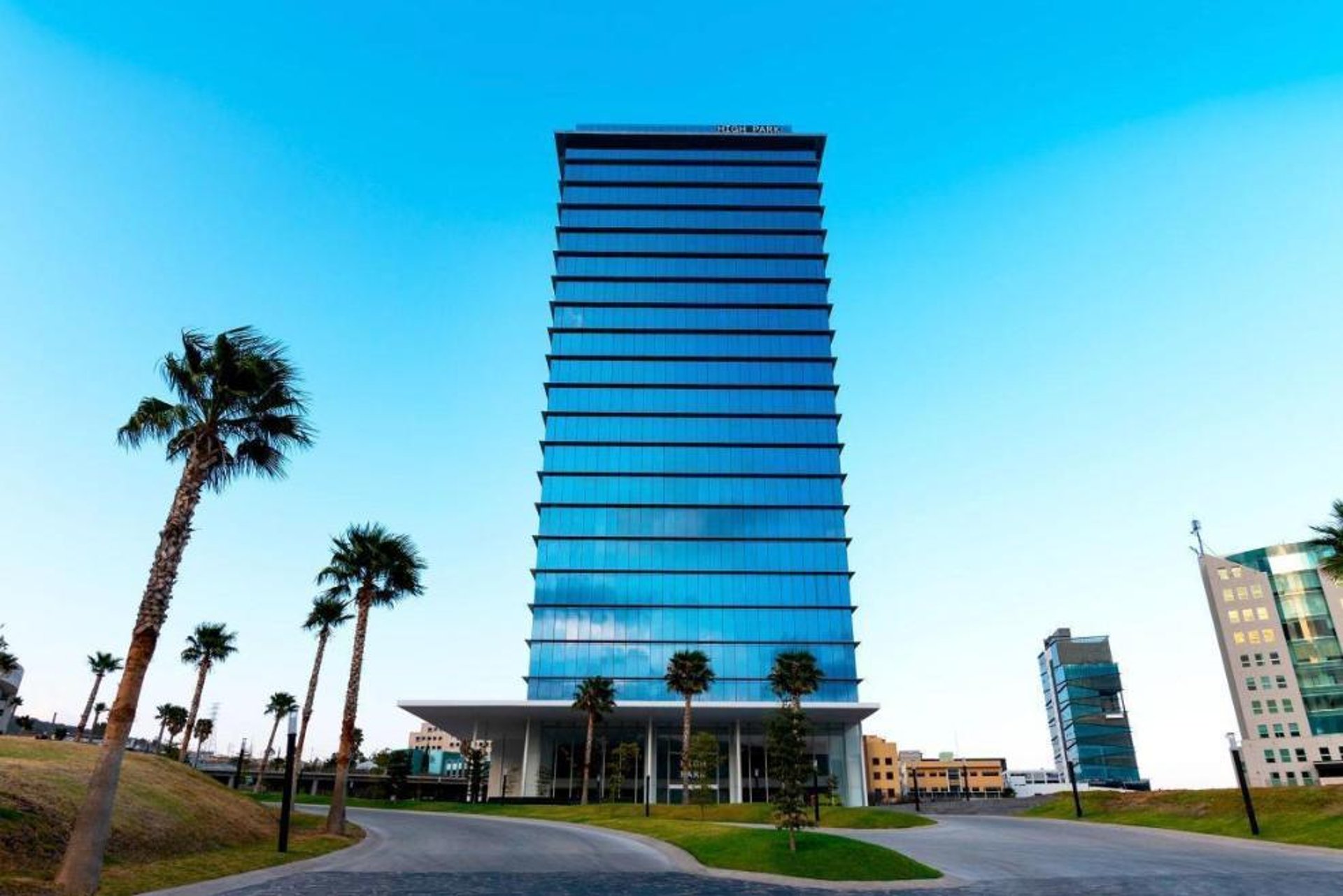 low angle photo of city high rise buildings during daytime