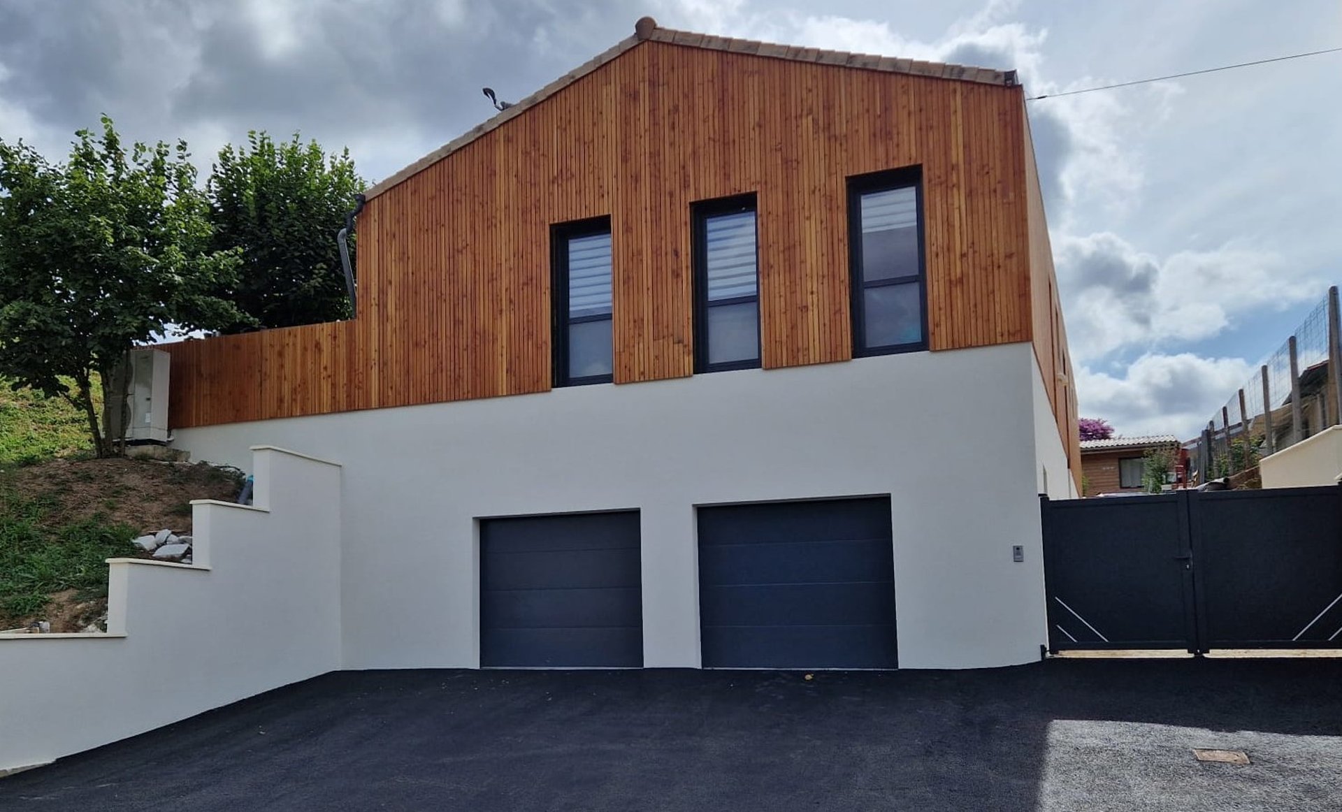 black and brown leather padded tub sofa