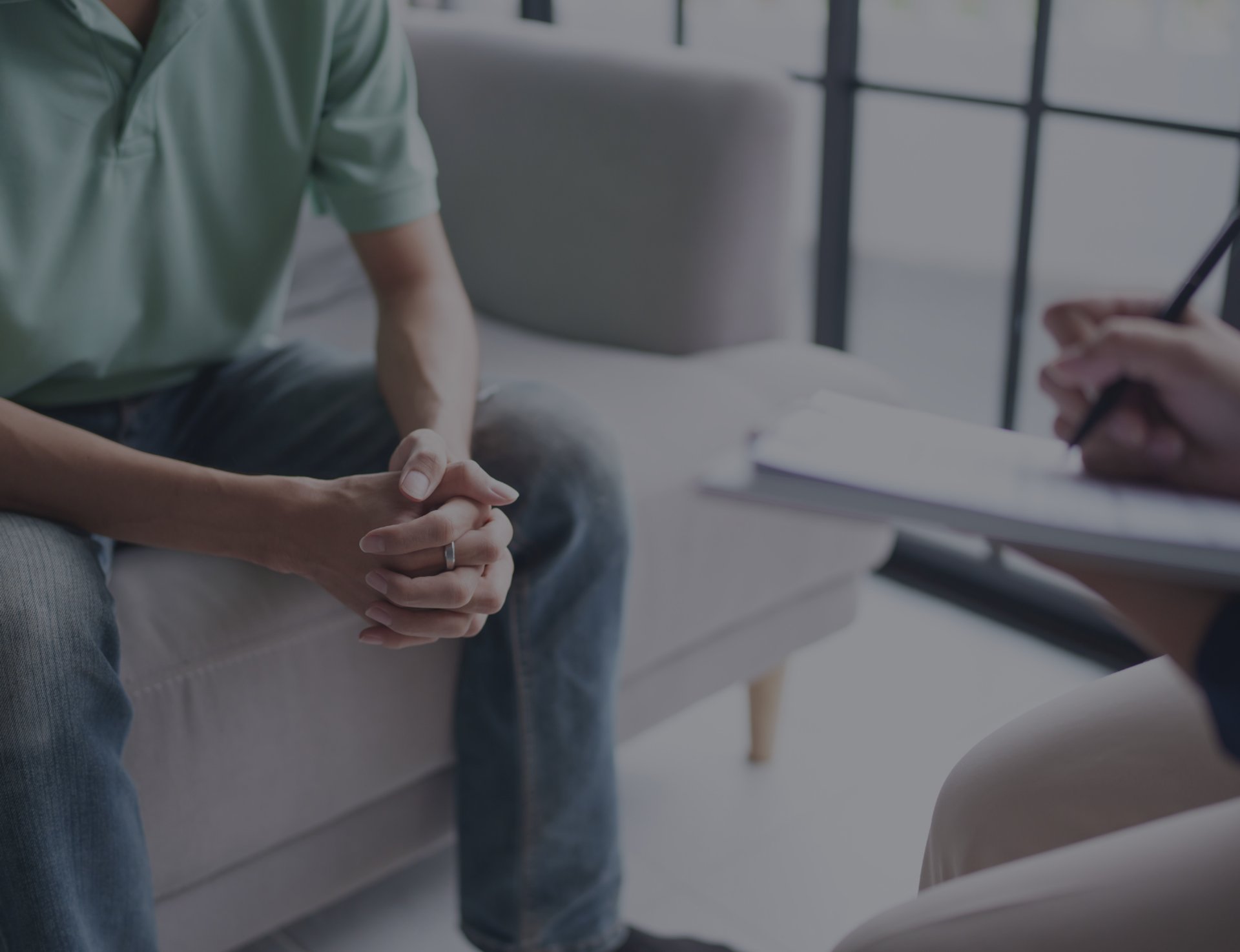 an abstract photo of a curved building with a blue sky in the background