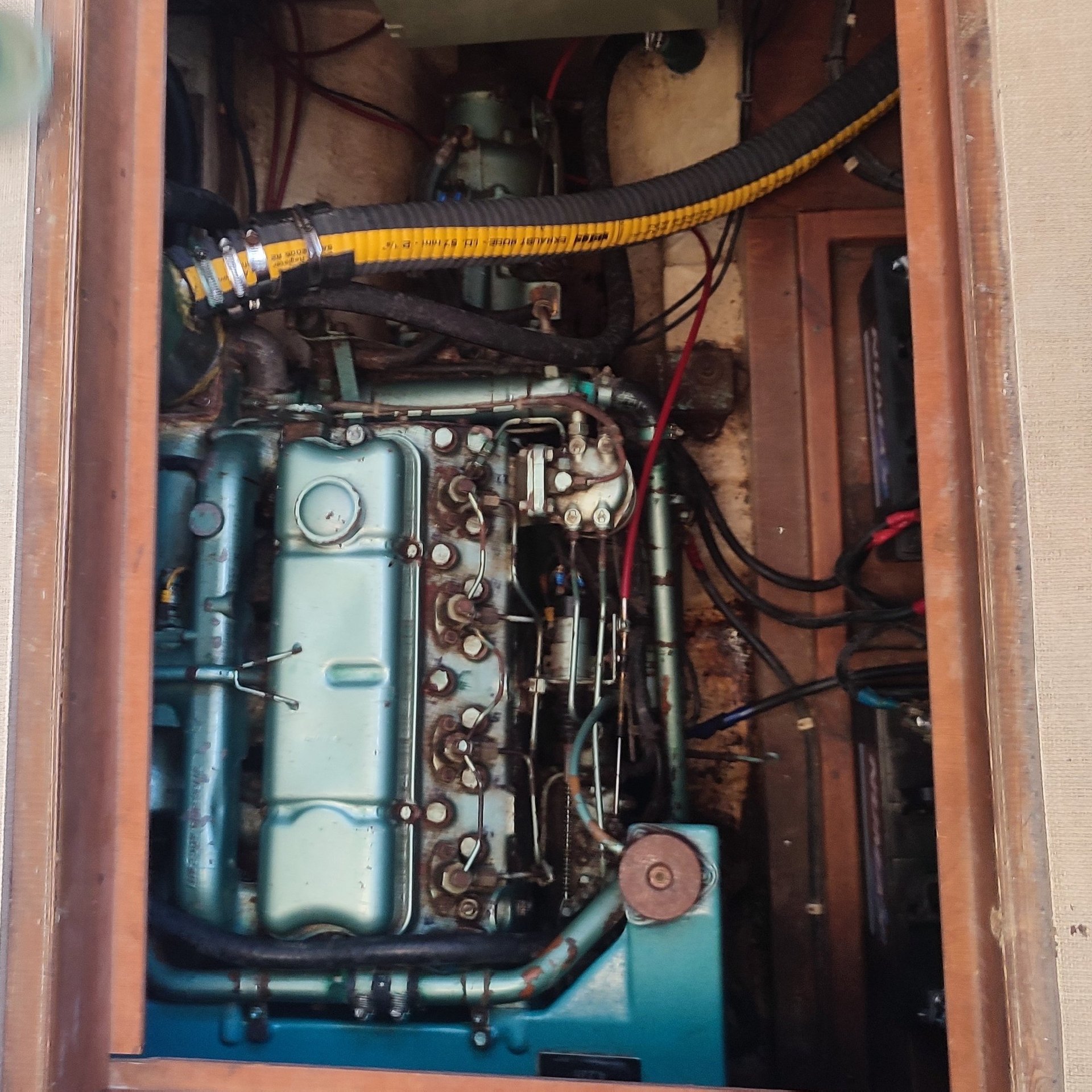 an abstract photo of a curved building with a blue sky in the background