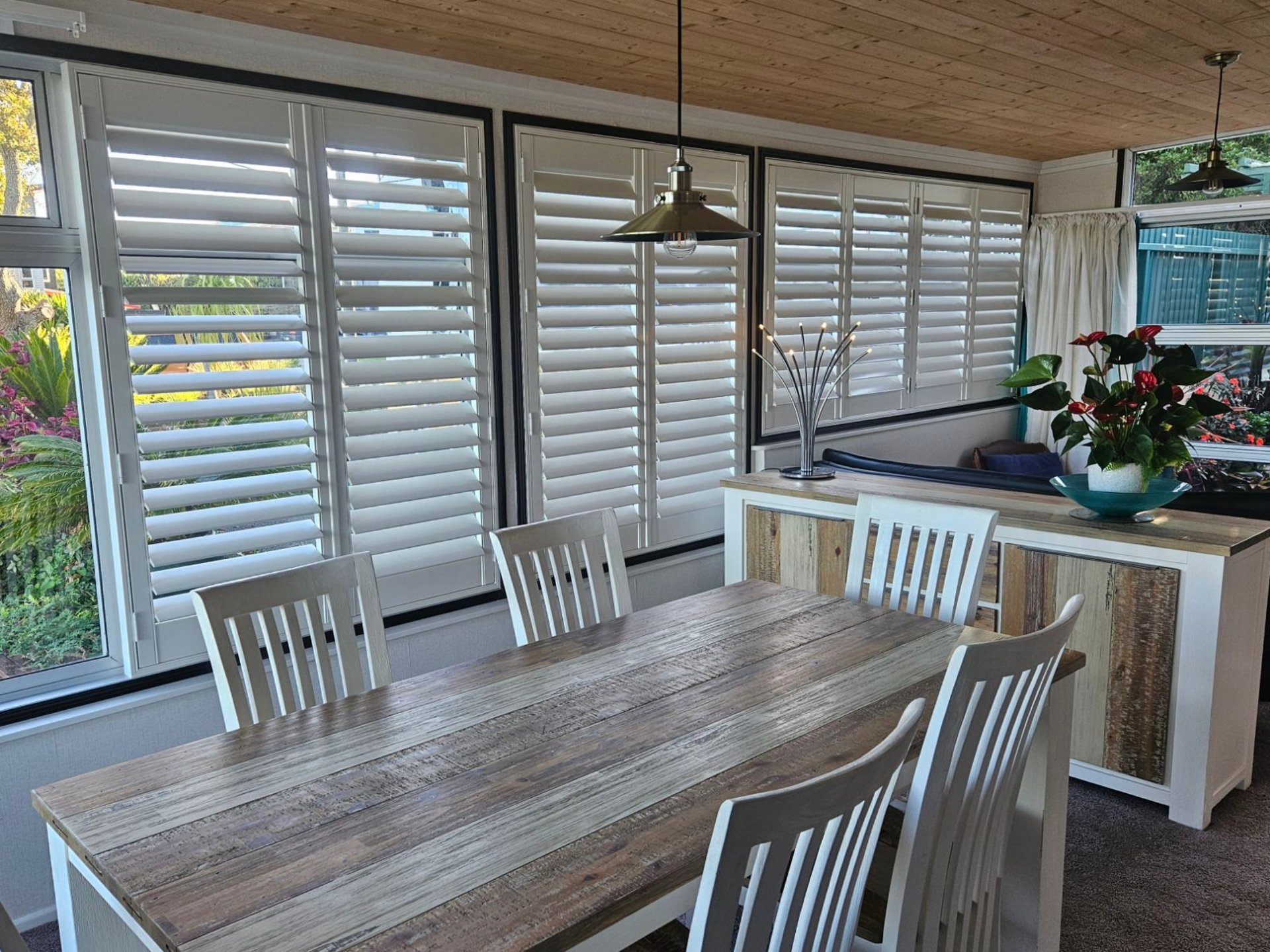 black and brown leather padded tub sofa
