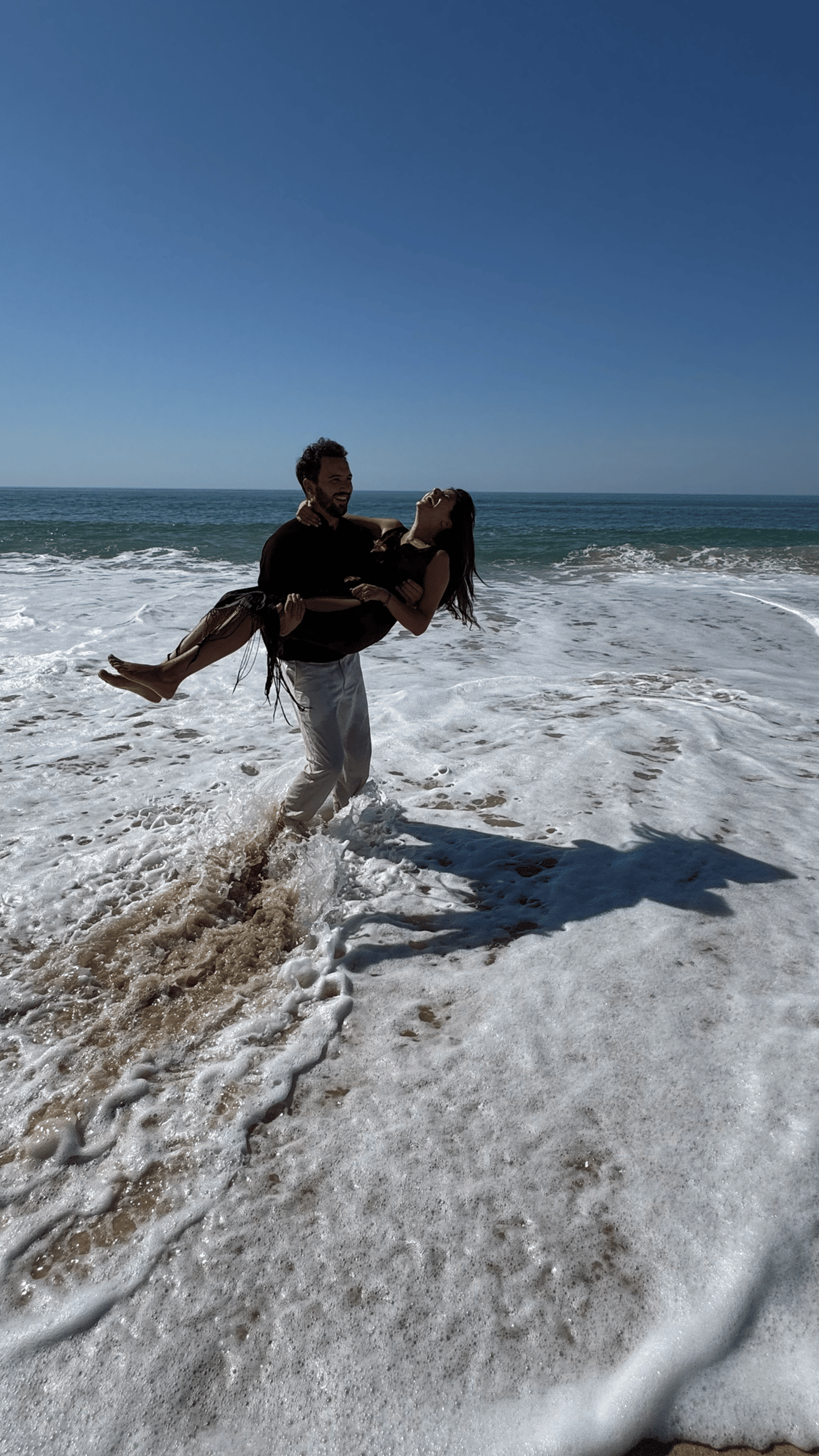 couple wearing silver-colored rings