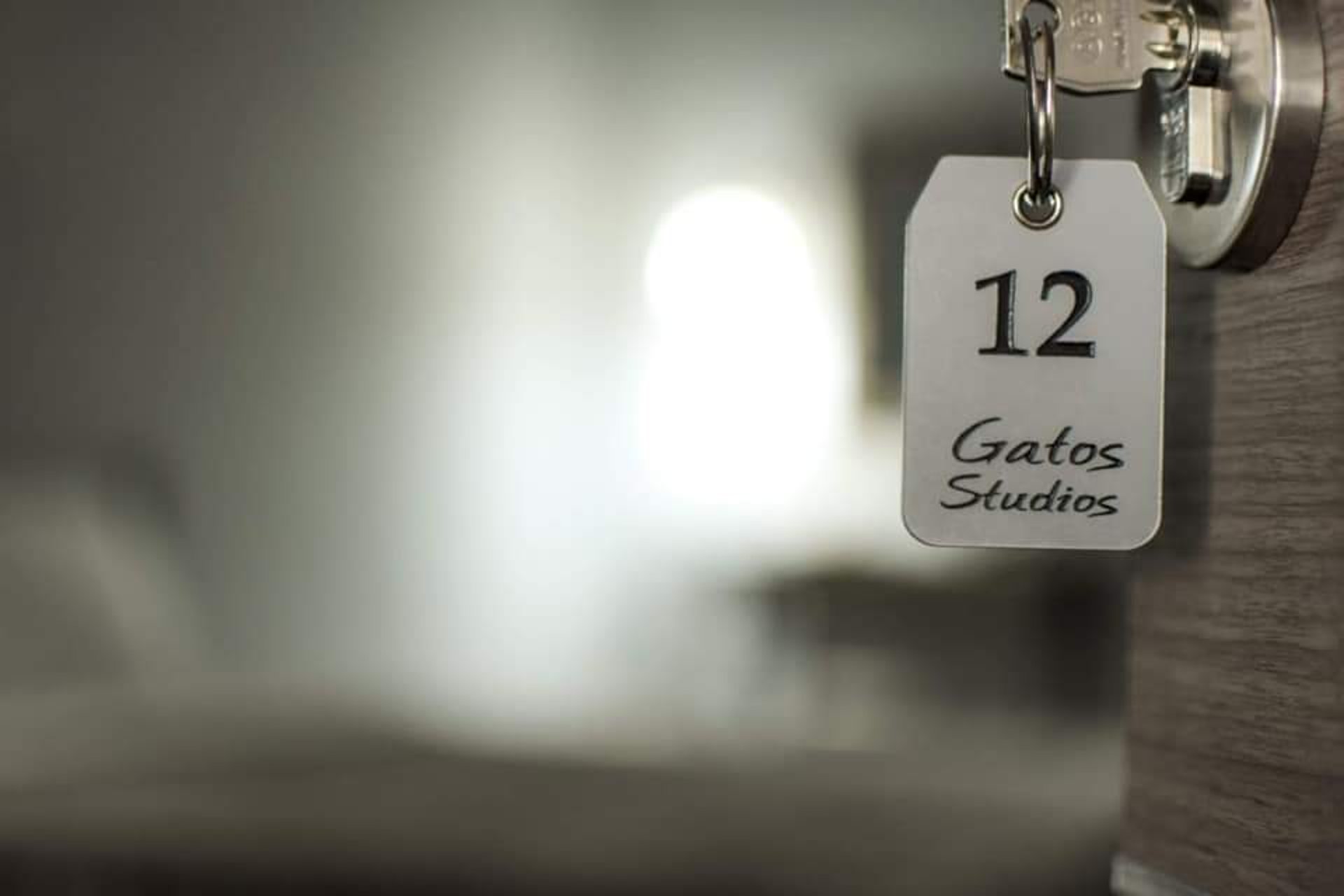 woman wearing yellow long-sleeved dress under white clouds and blue sky during daytime
