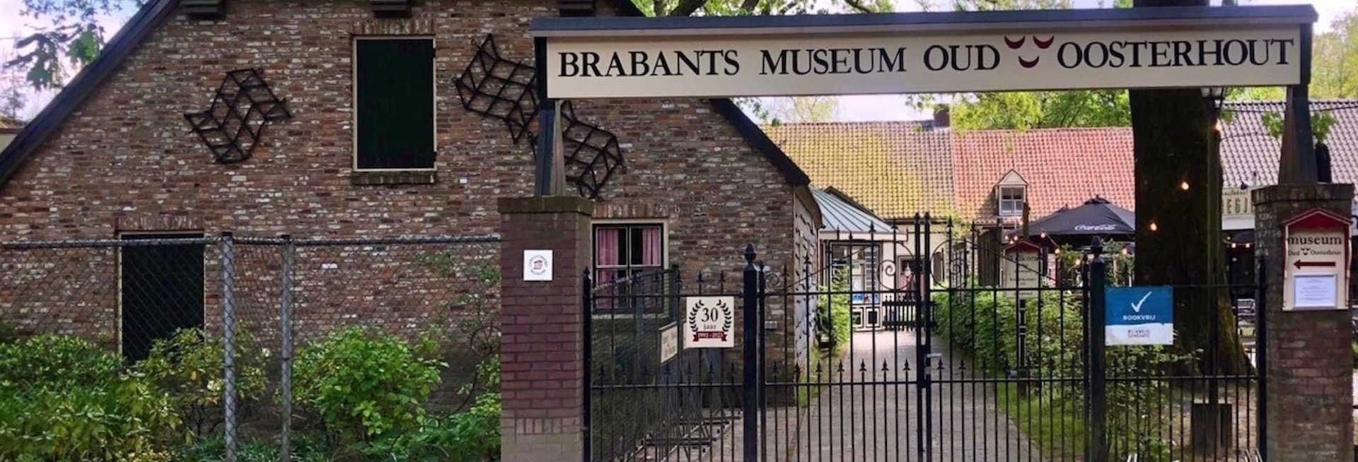 black and brown leather padded tub sofa