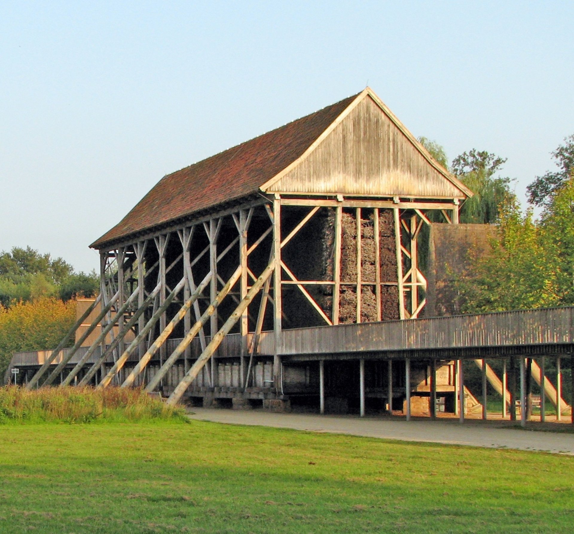 white and green train on rail tracks