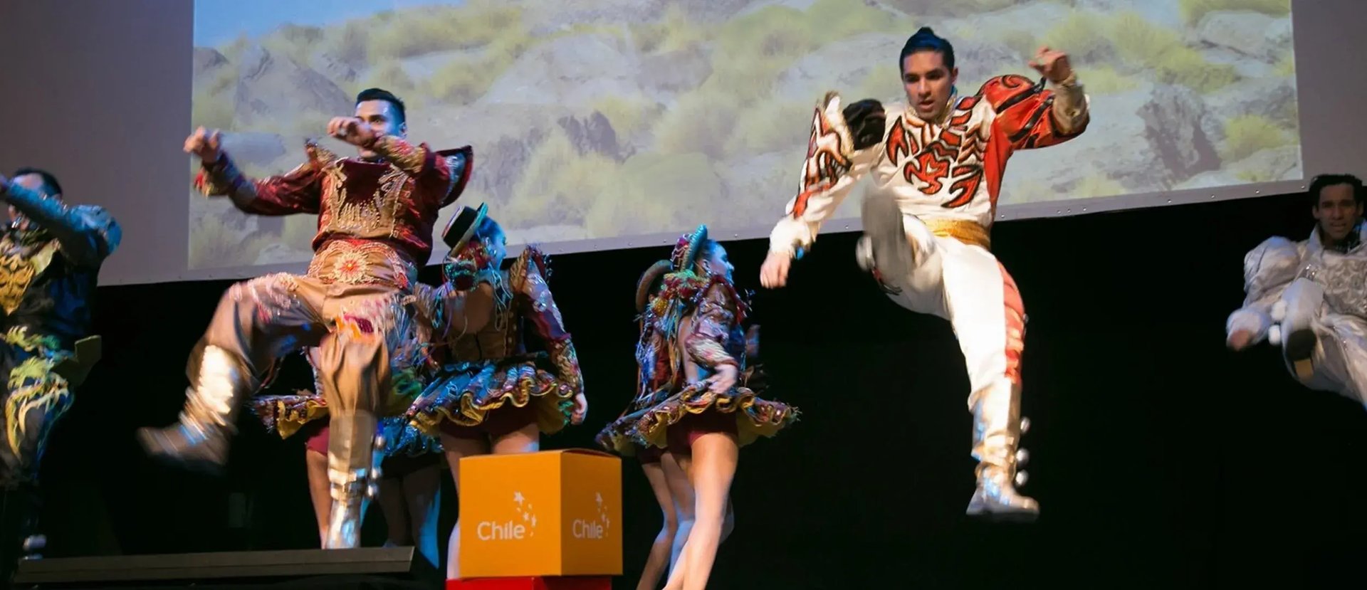 an abstract photo of a curved building with a blue sky in the background
