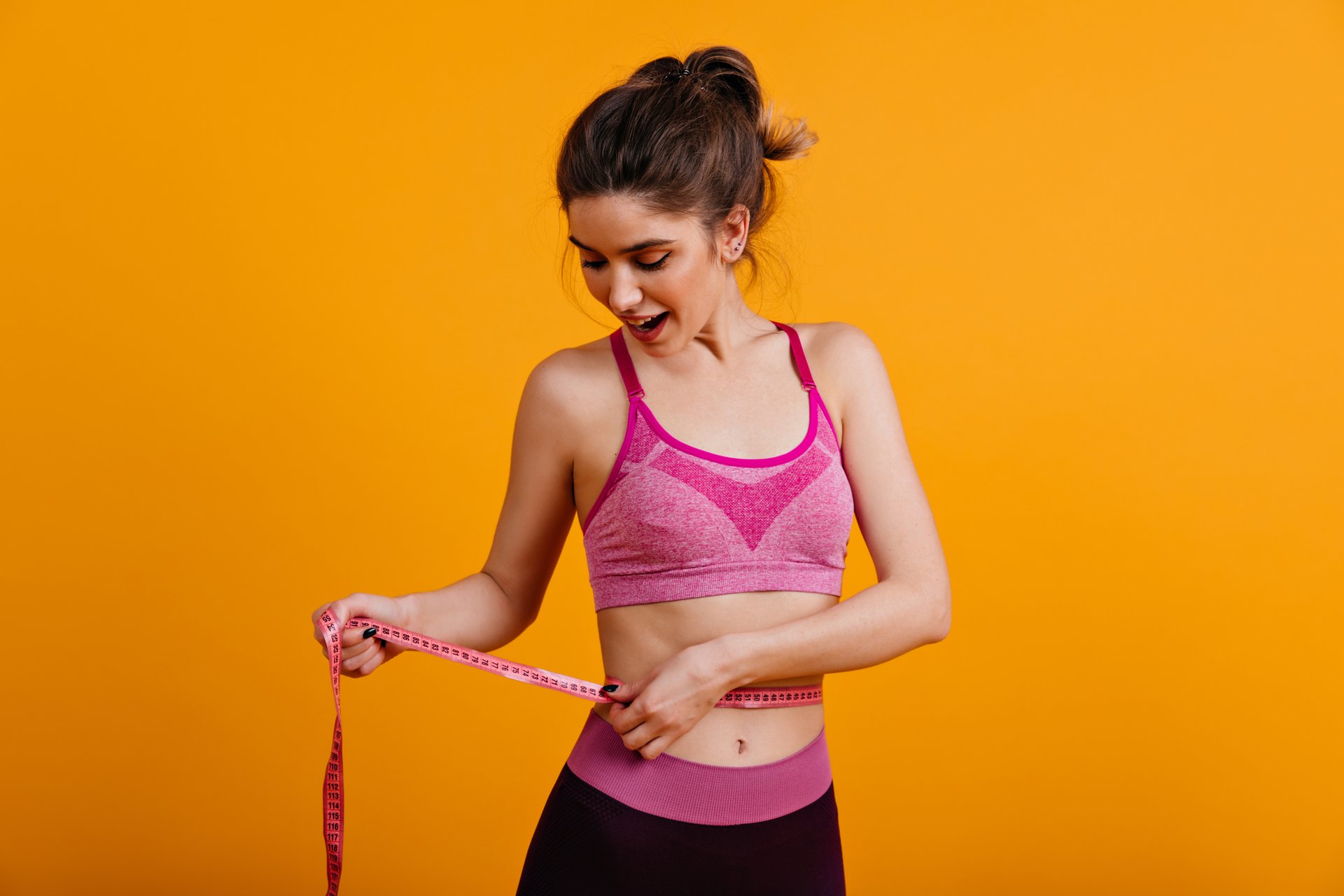 a man holding his stomach with his hands