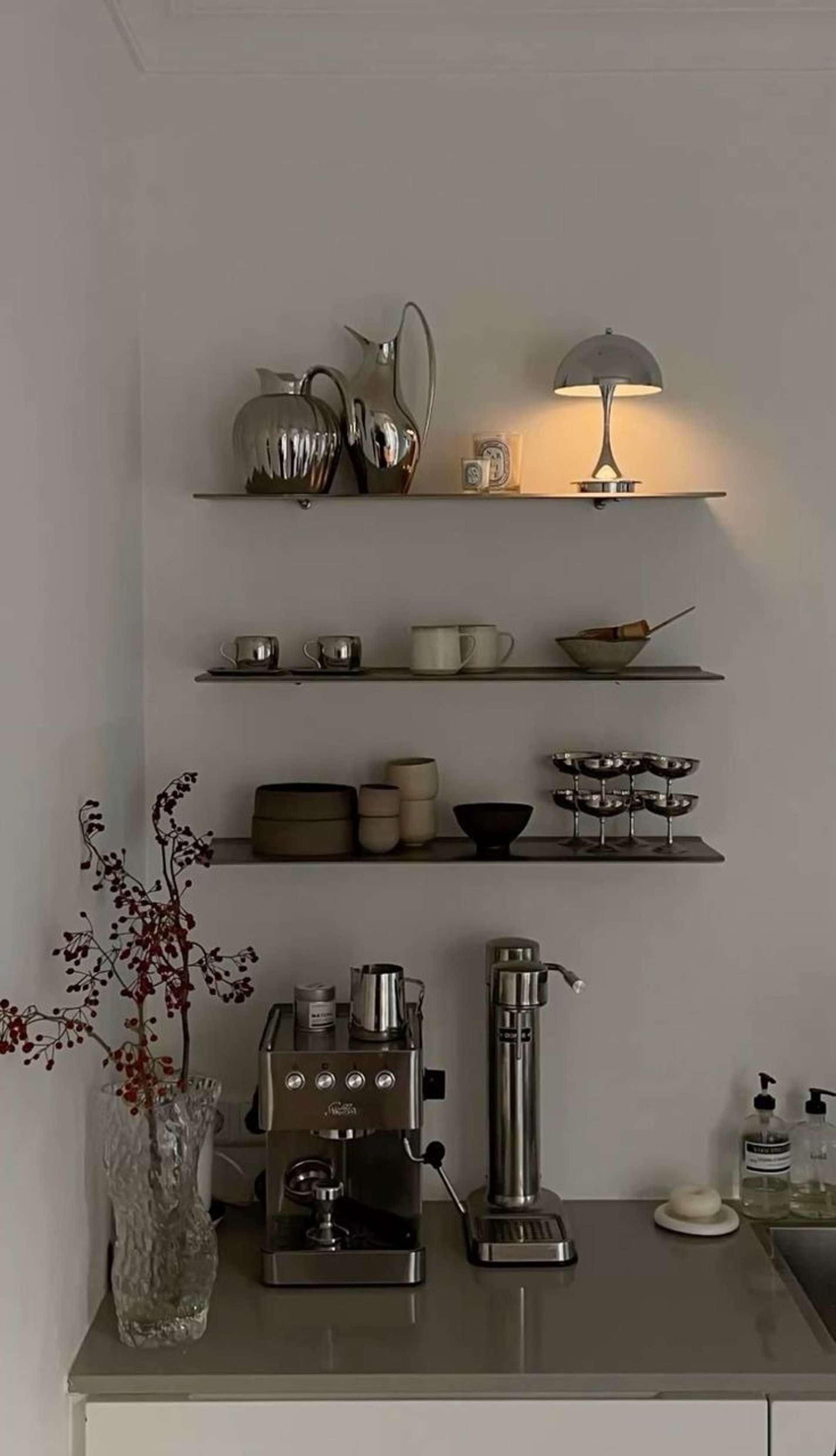 an abstract photo of a curved building with a blue sky in the background