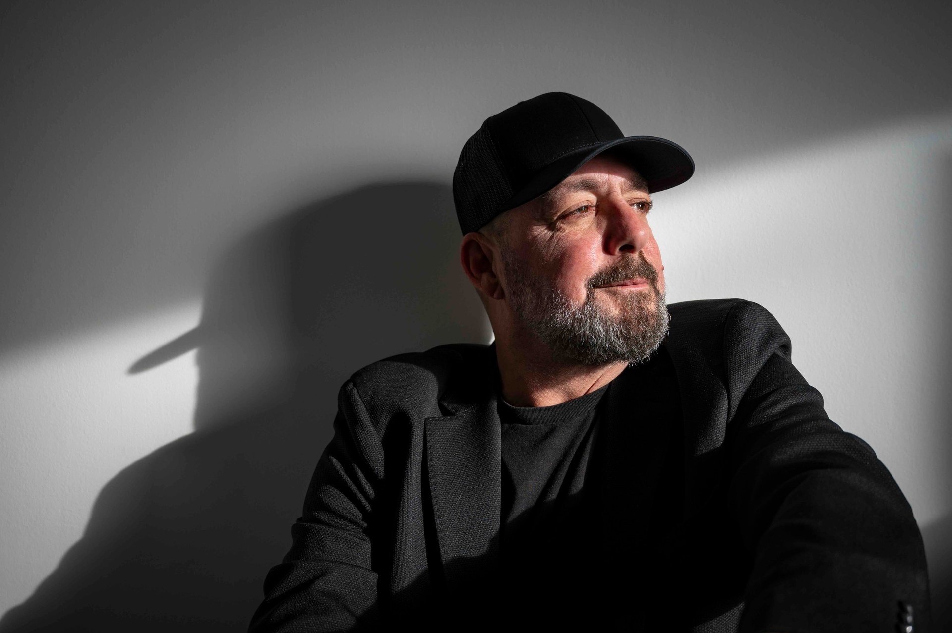 black and brown leather padded tub sofa