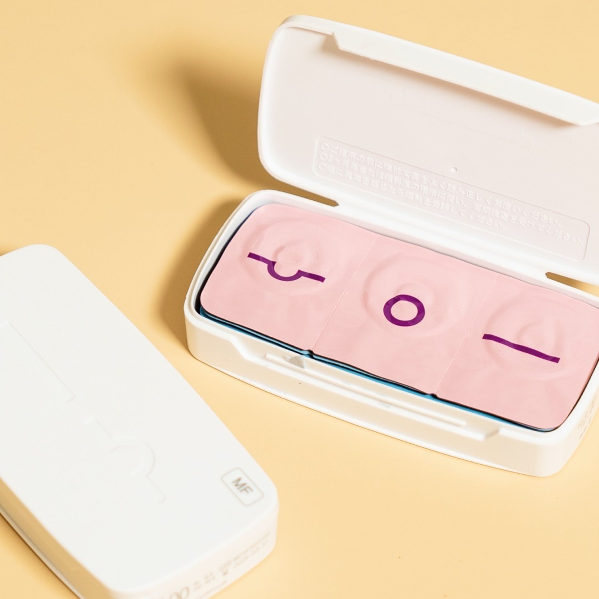 an abstract photo of a curved building with a blue sky in the background