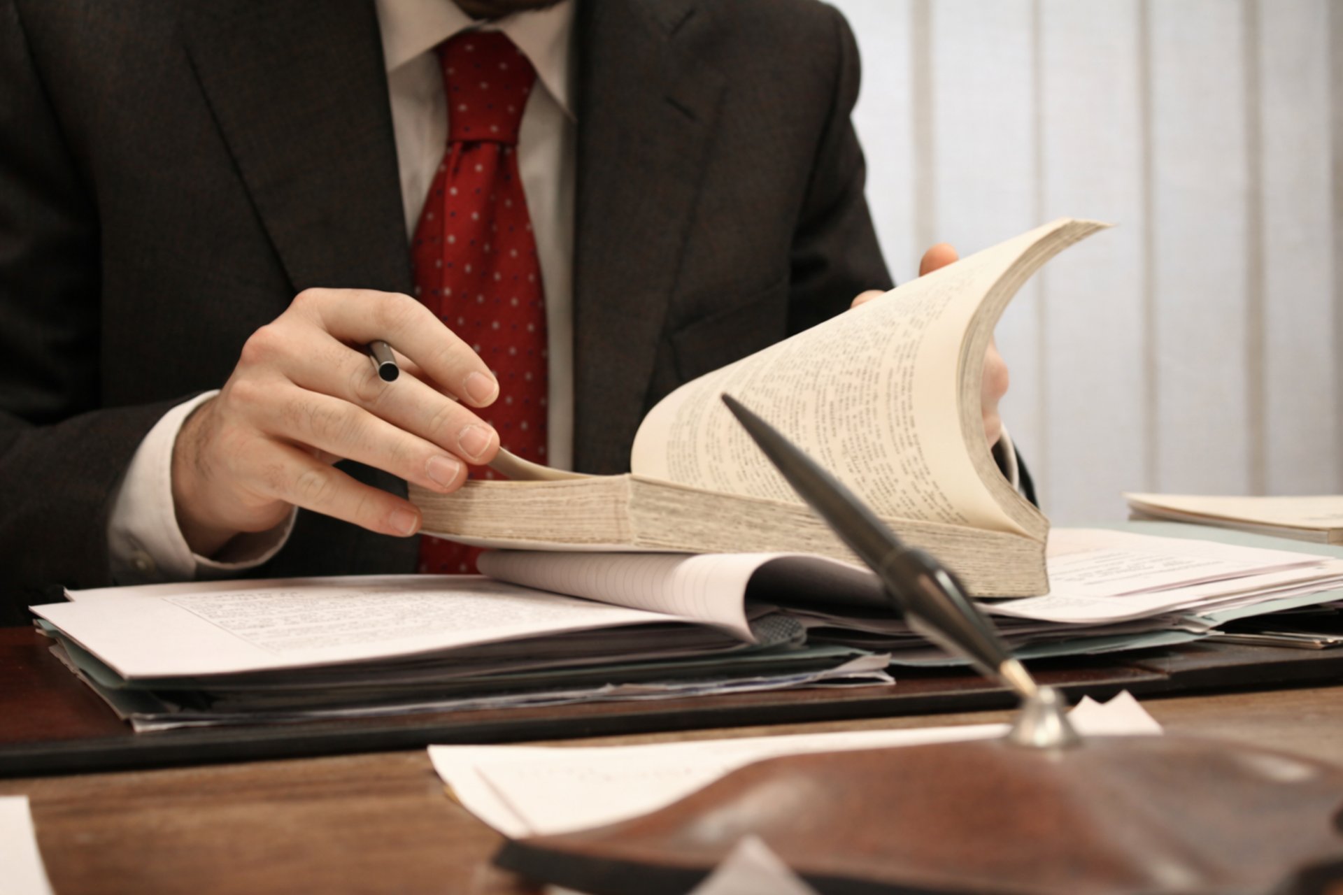 black and brown leather padded tub sofa