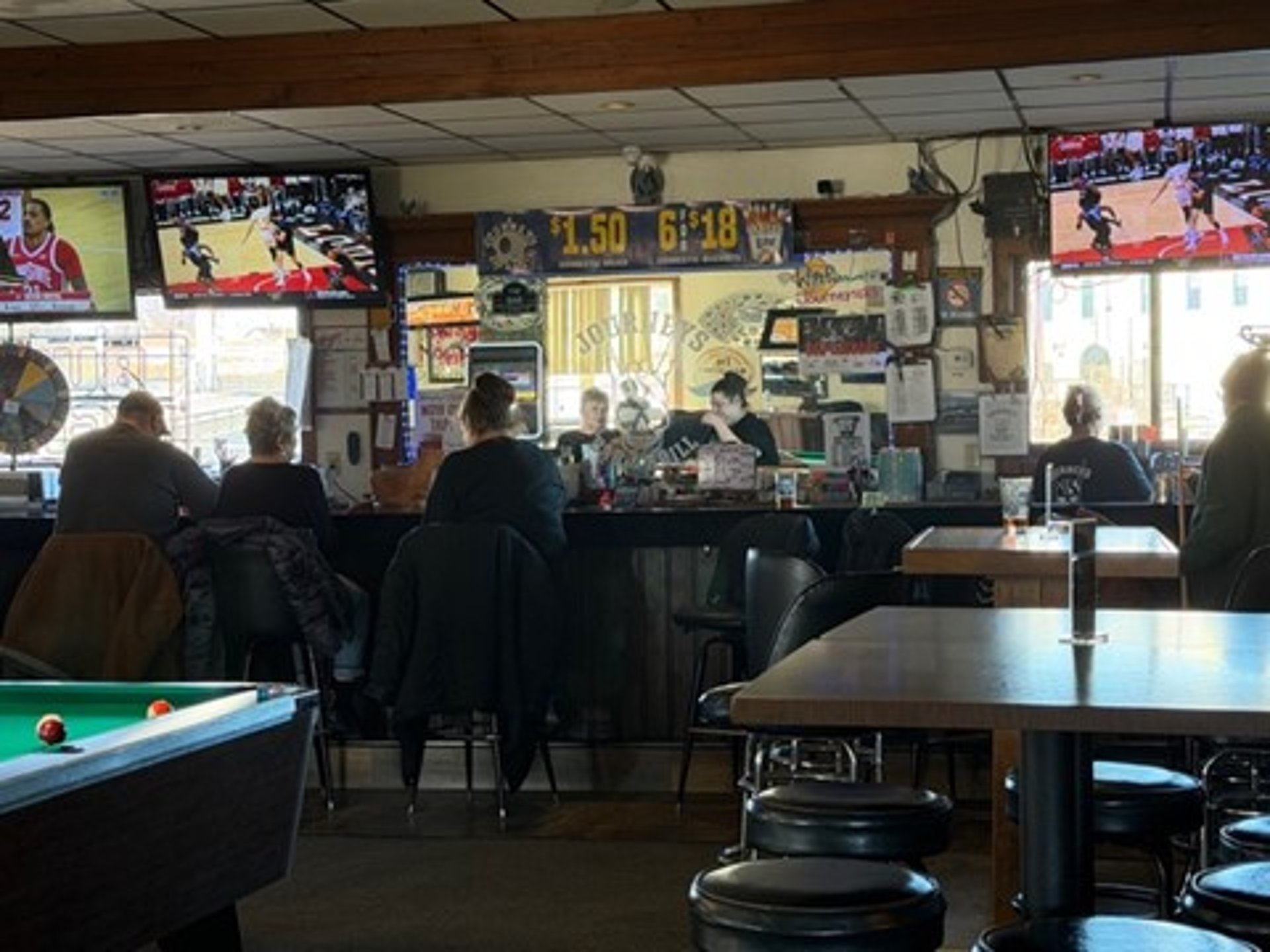 woman wearing yellow long-sleeved dress under white clouds and blue sky during daytime