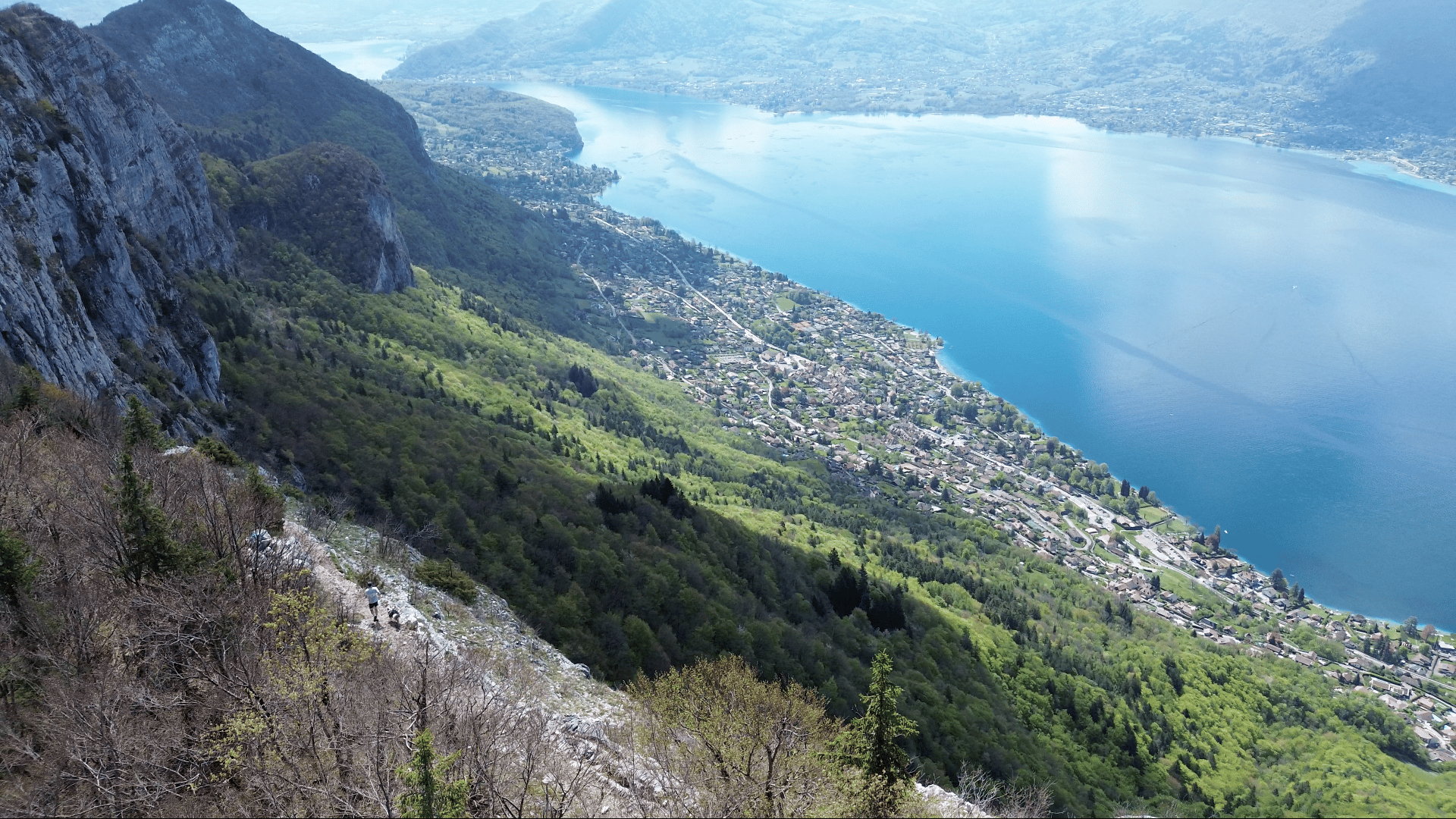 Glacial lake and mountains under blue sky