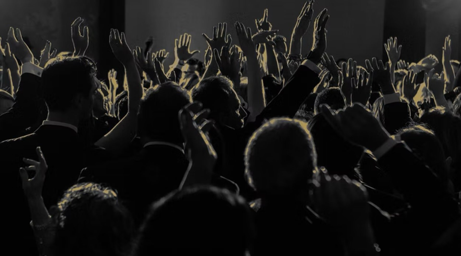 a close up of a black and brown abstract painting