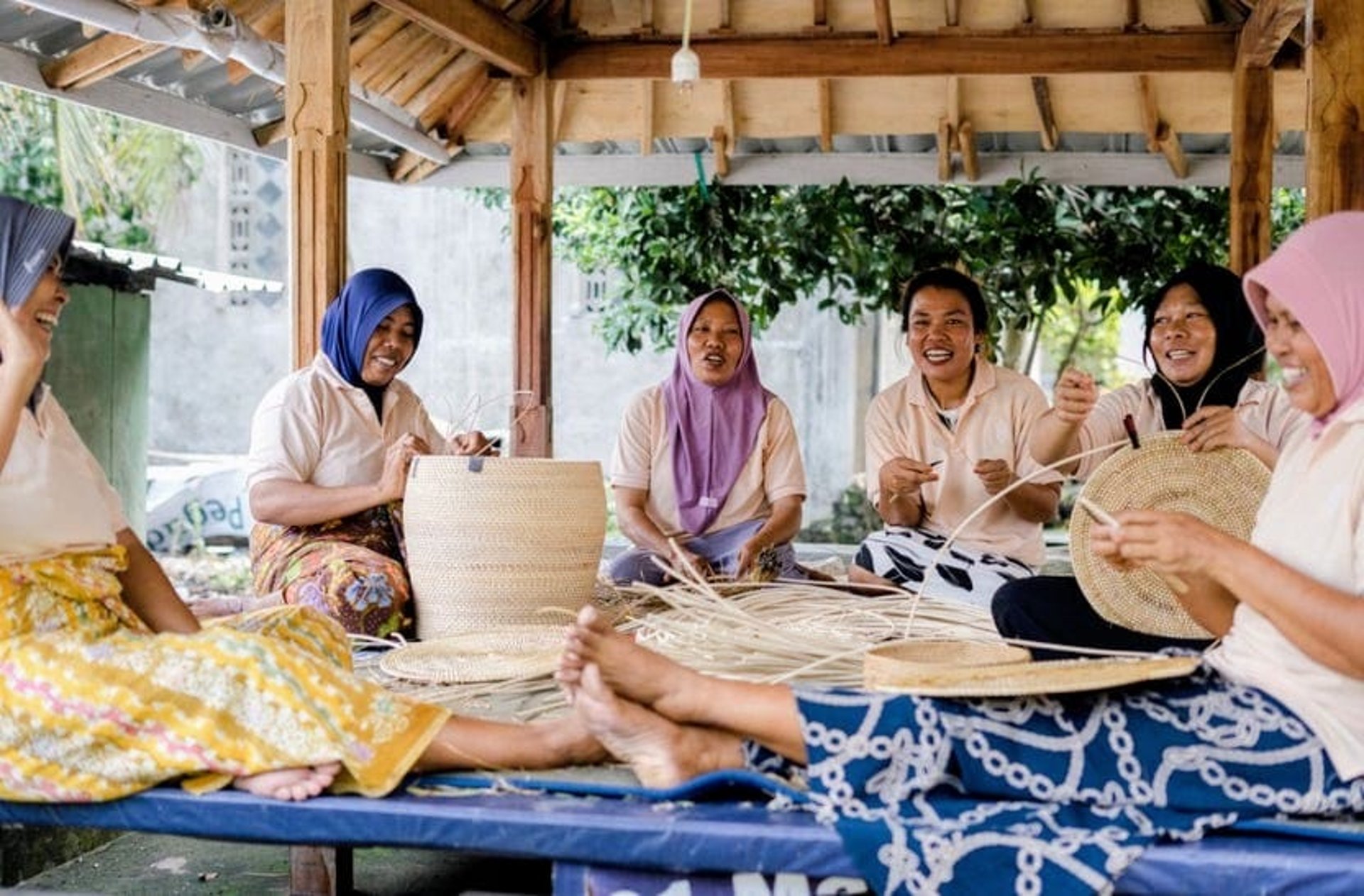 an abstract photo of a curved building with a blue sky in the background