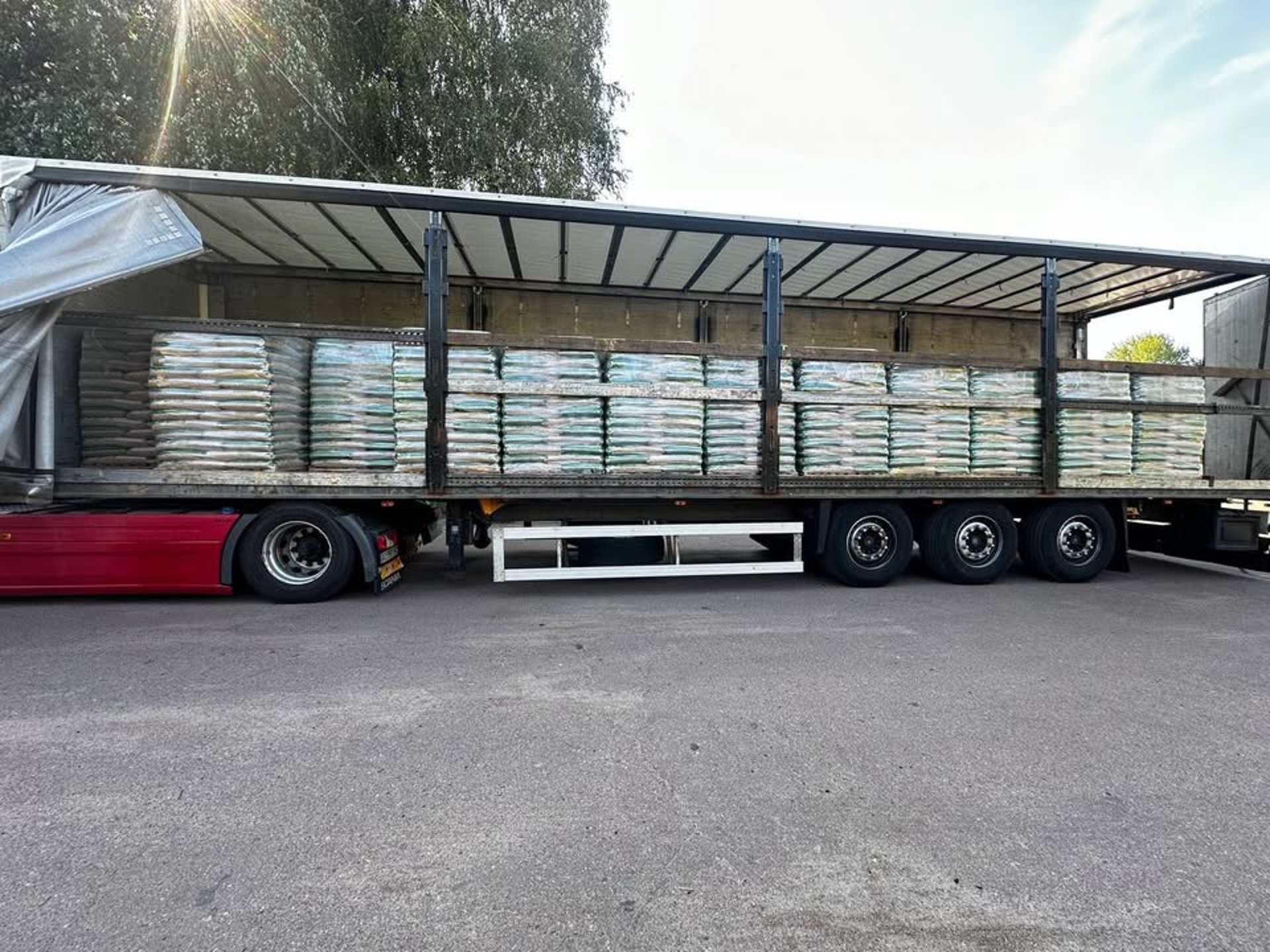 an abstract photo of a curved building with a blue sky in the background
