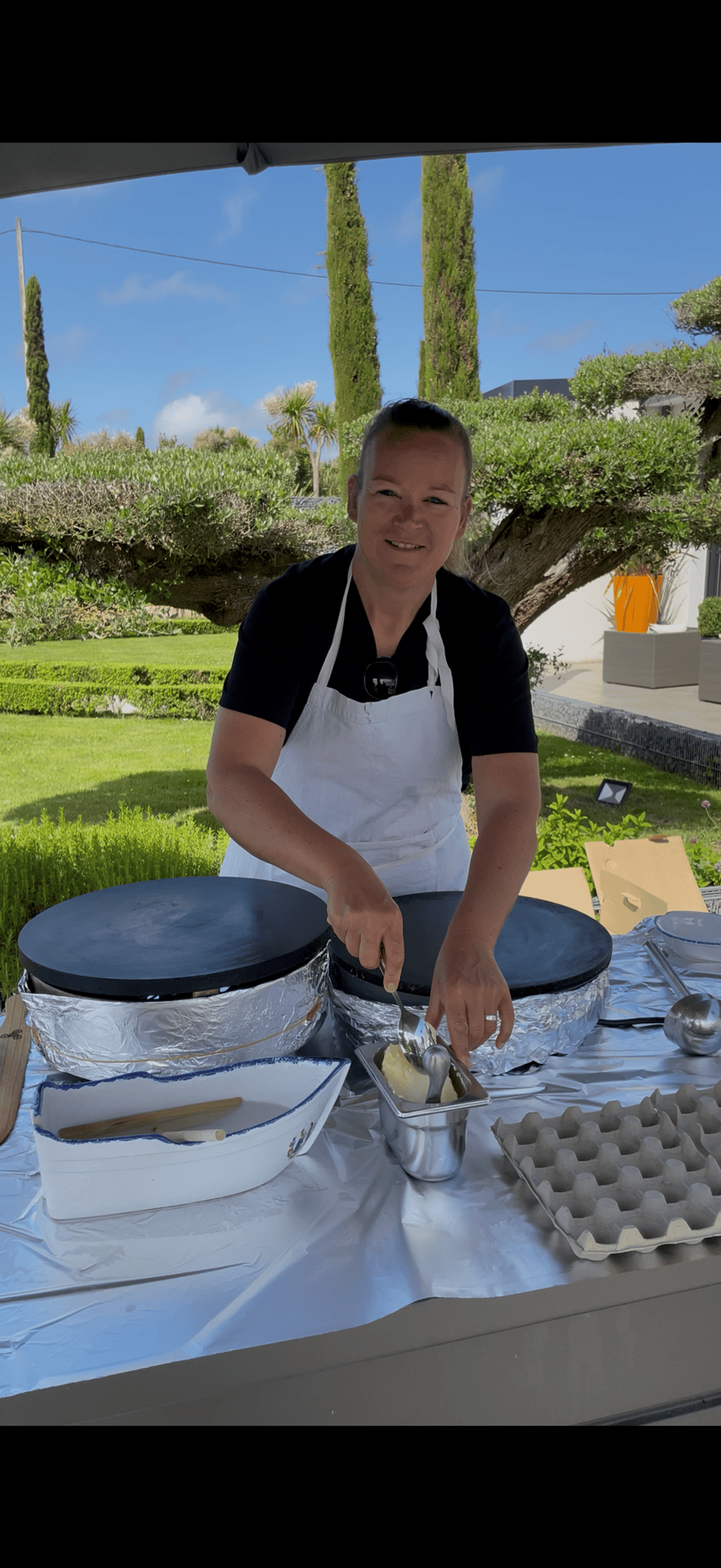 woman wearing yellow long-sleeved dress under white clouds and blue sky during daytime