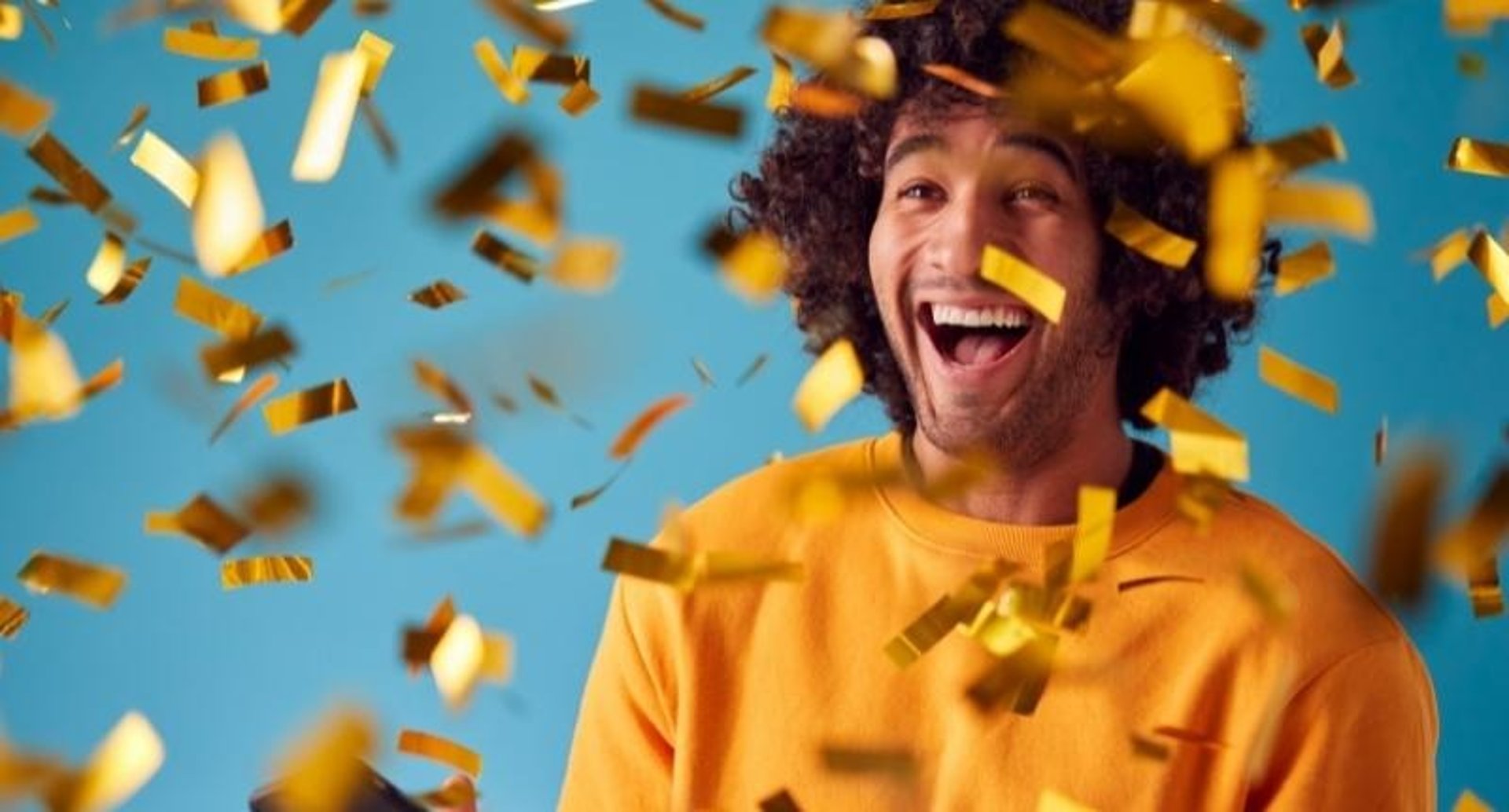 woman wearing yellow long-sleeved dress under white clouds and blue sky during daytime
