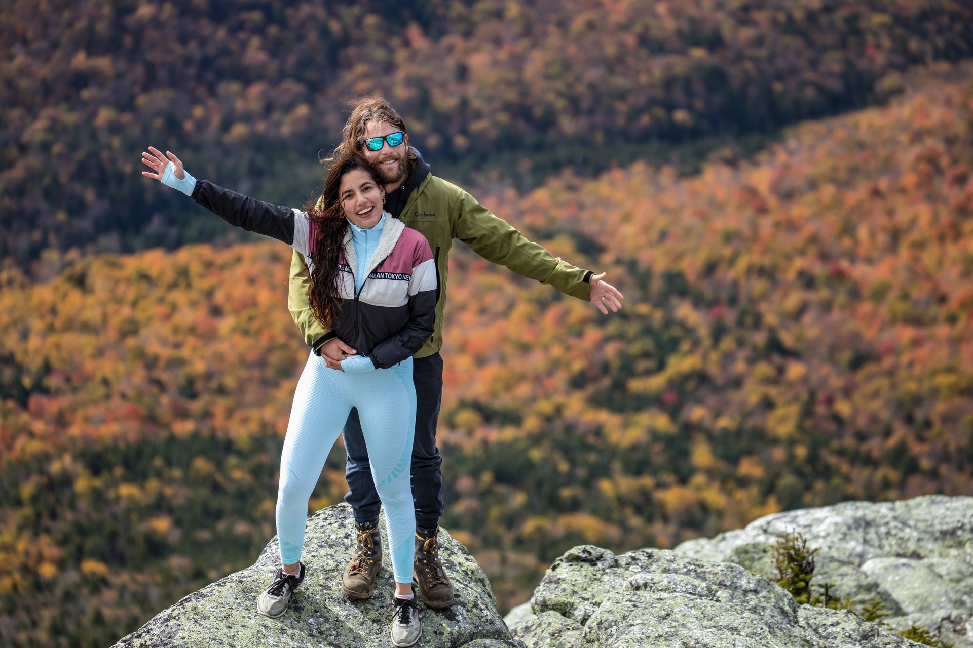 couple wearing silver-colored rings