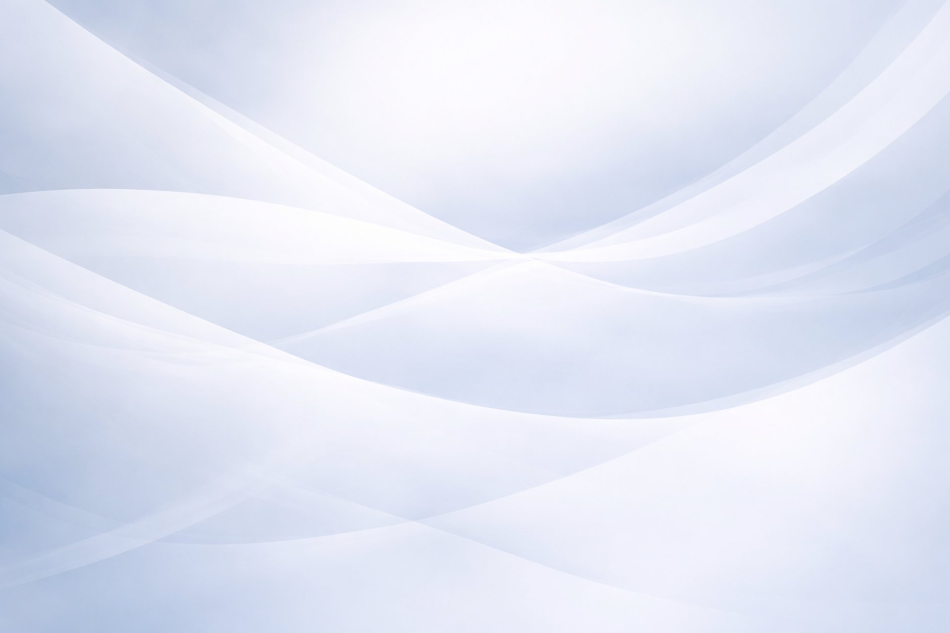 an abstract photo of a curved building with a blue sky in the background