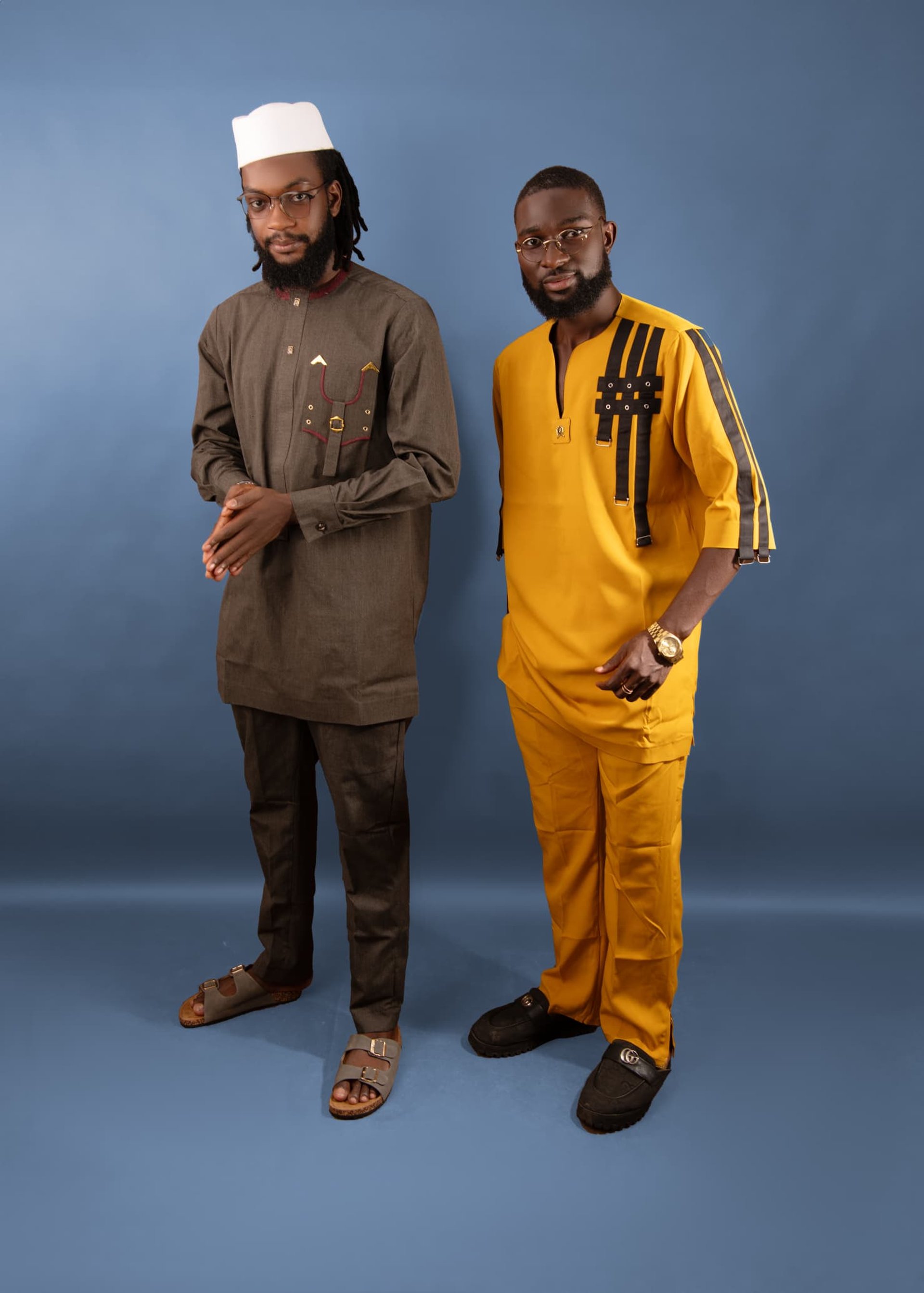 black and brown leather padded tub sofa