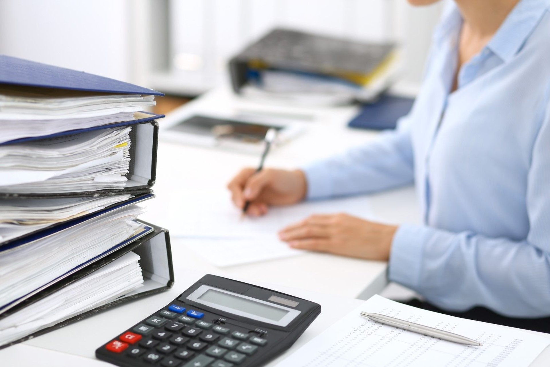 A woman working on accounts payable for bookkeeping