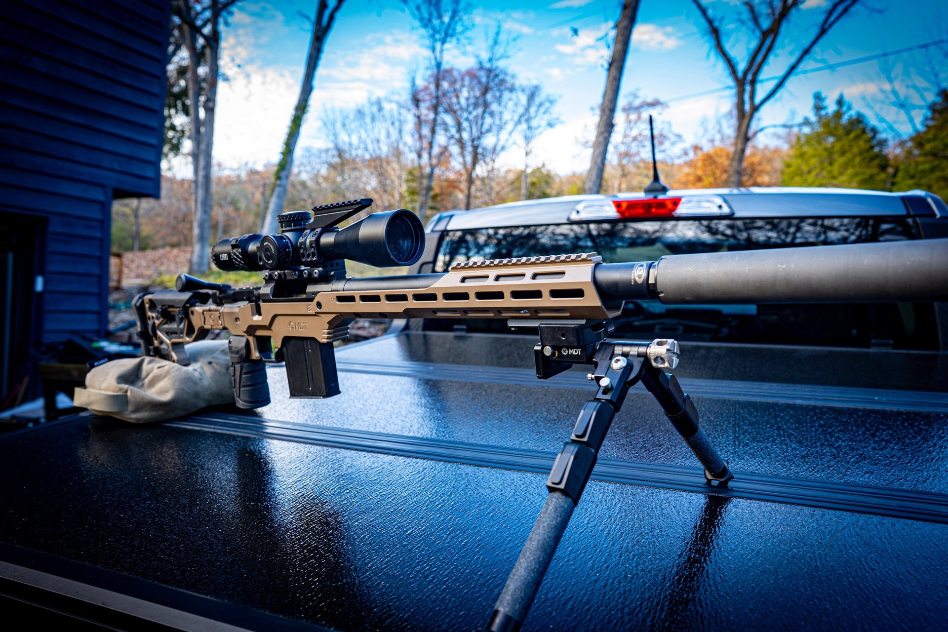 an abstract photo of a curved building with a blue sky in the background